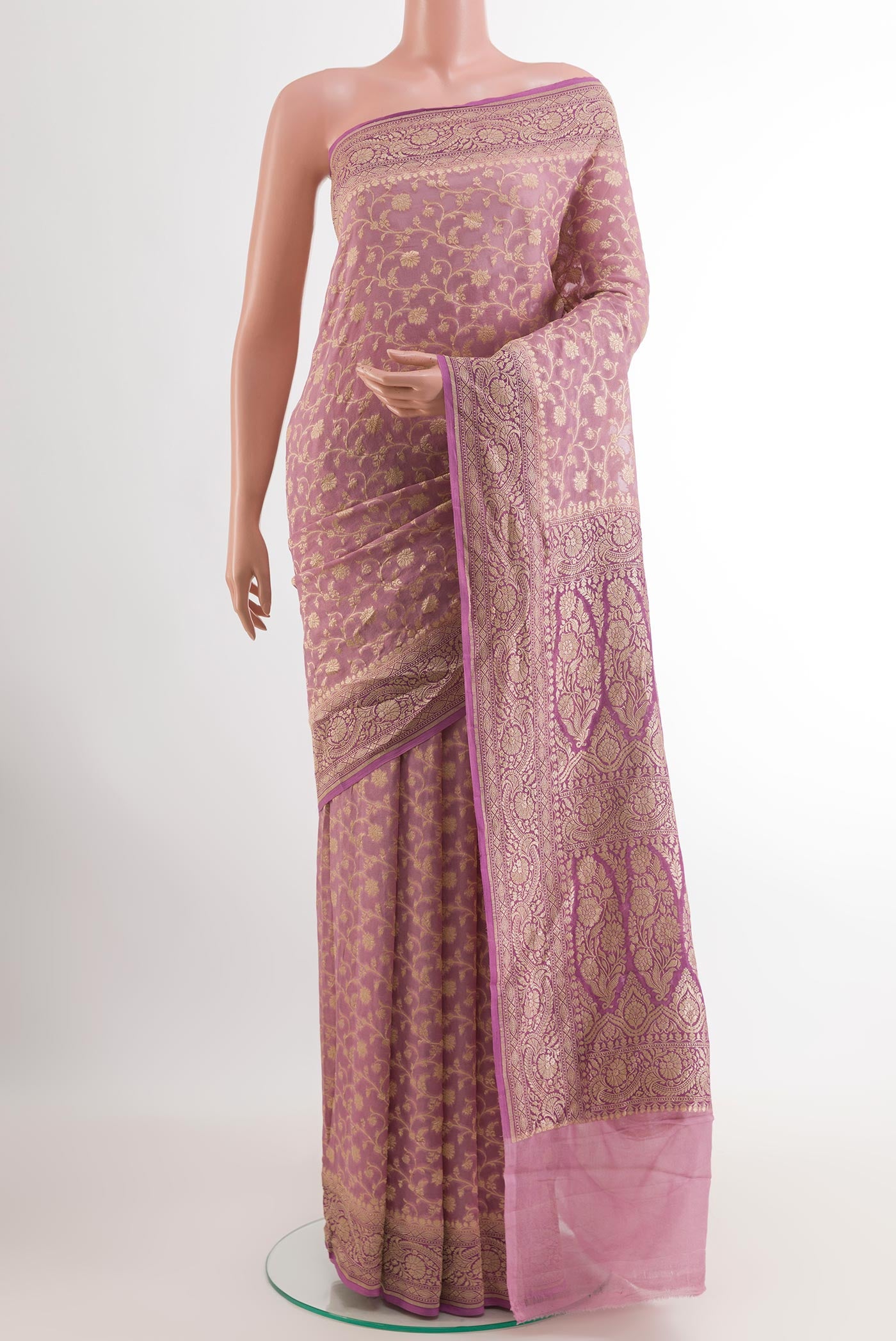 Lavender Banarasi Georgette Saree with Zari Brocade on the body and Thread Border.  displayed on a mannequin