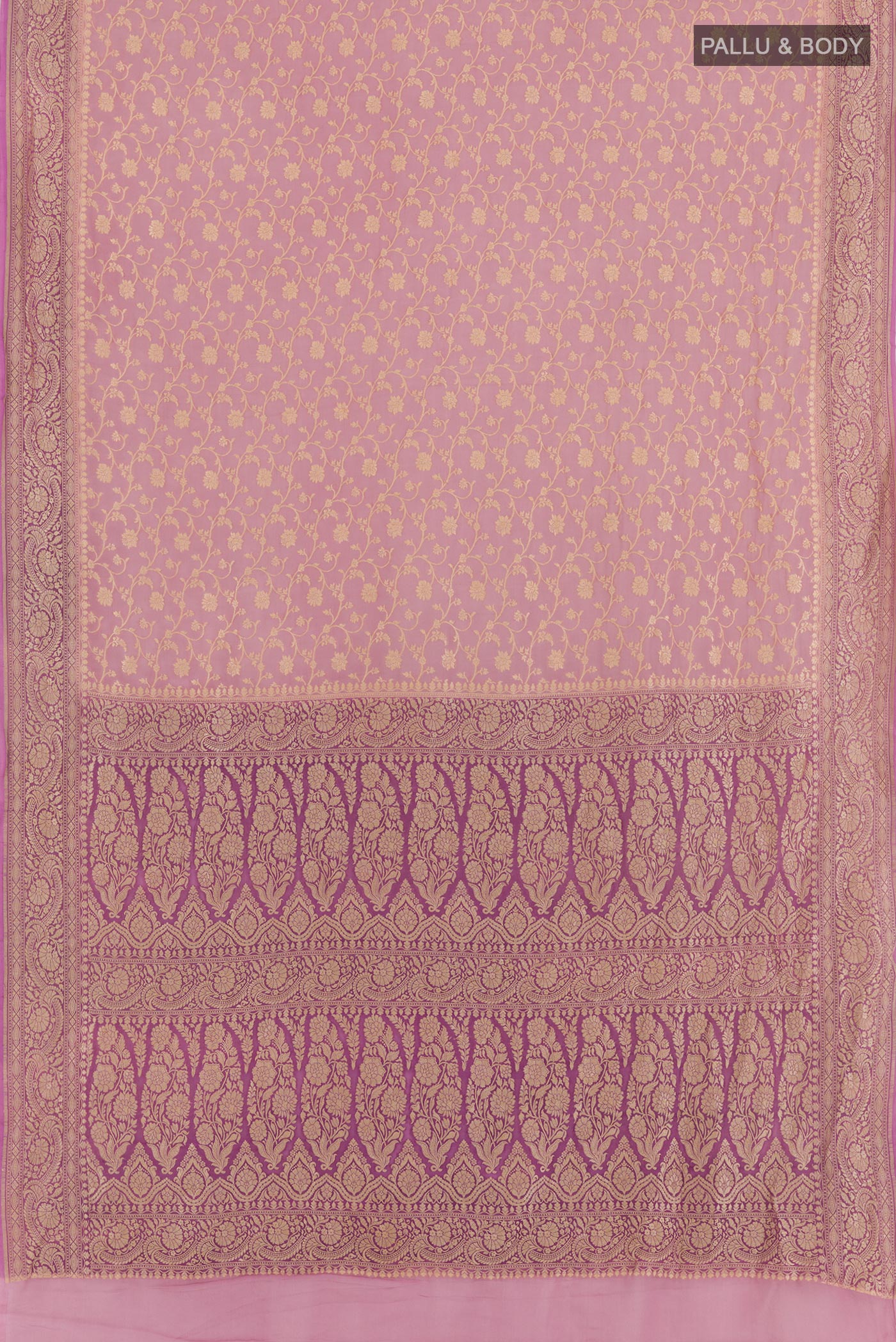 Flat view of Lavender Banarasi Georgette Saree with Zari Brocade on the body and Thread Border. 
