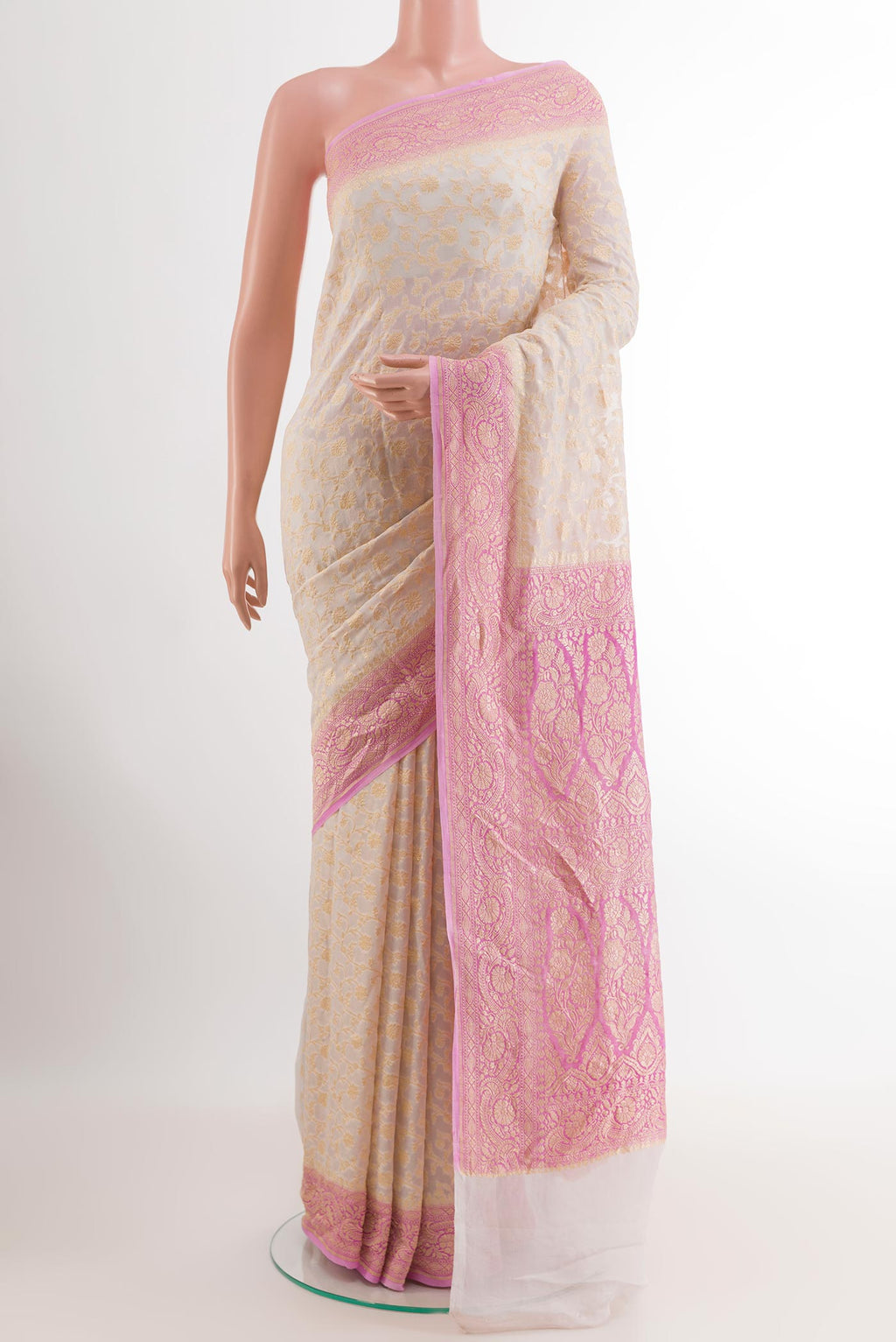 Pink Banarasi Georgette Saree with Zari Brocade on the body and Zari Border.  displayed on a mannequin