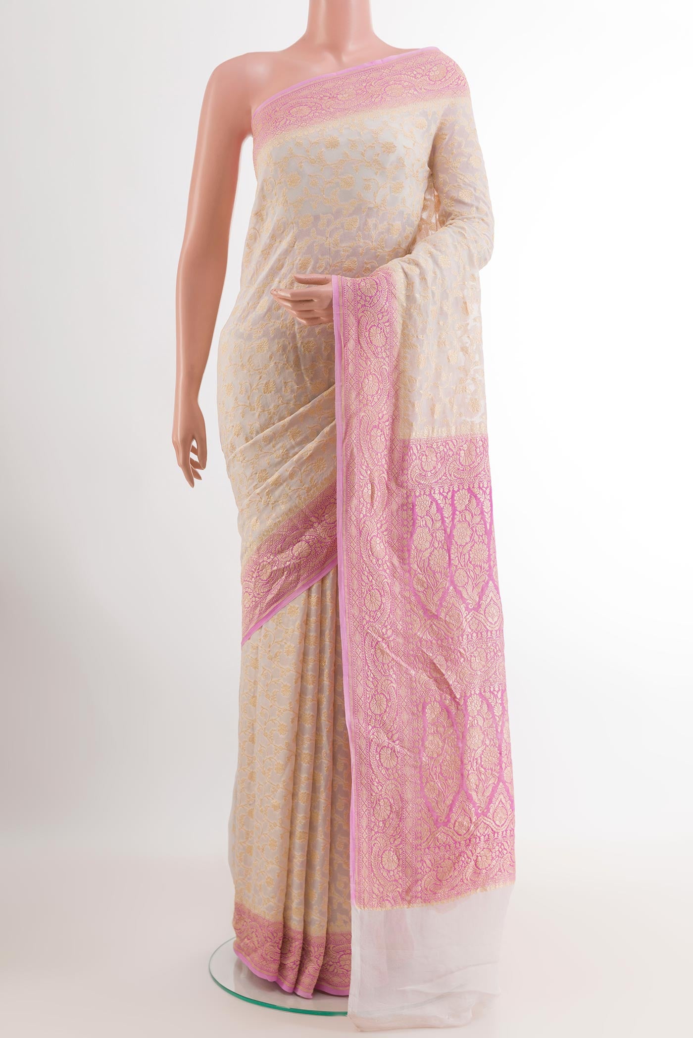 Pink Banarasi Georgette Saree with Zari Brocade on the body and Zari Border.  displayed on a mannequin