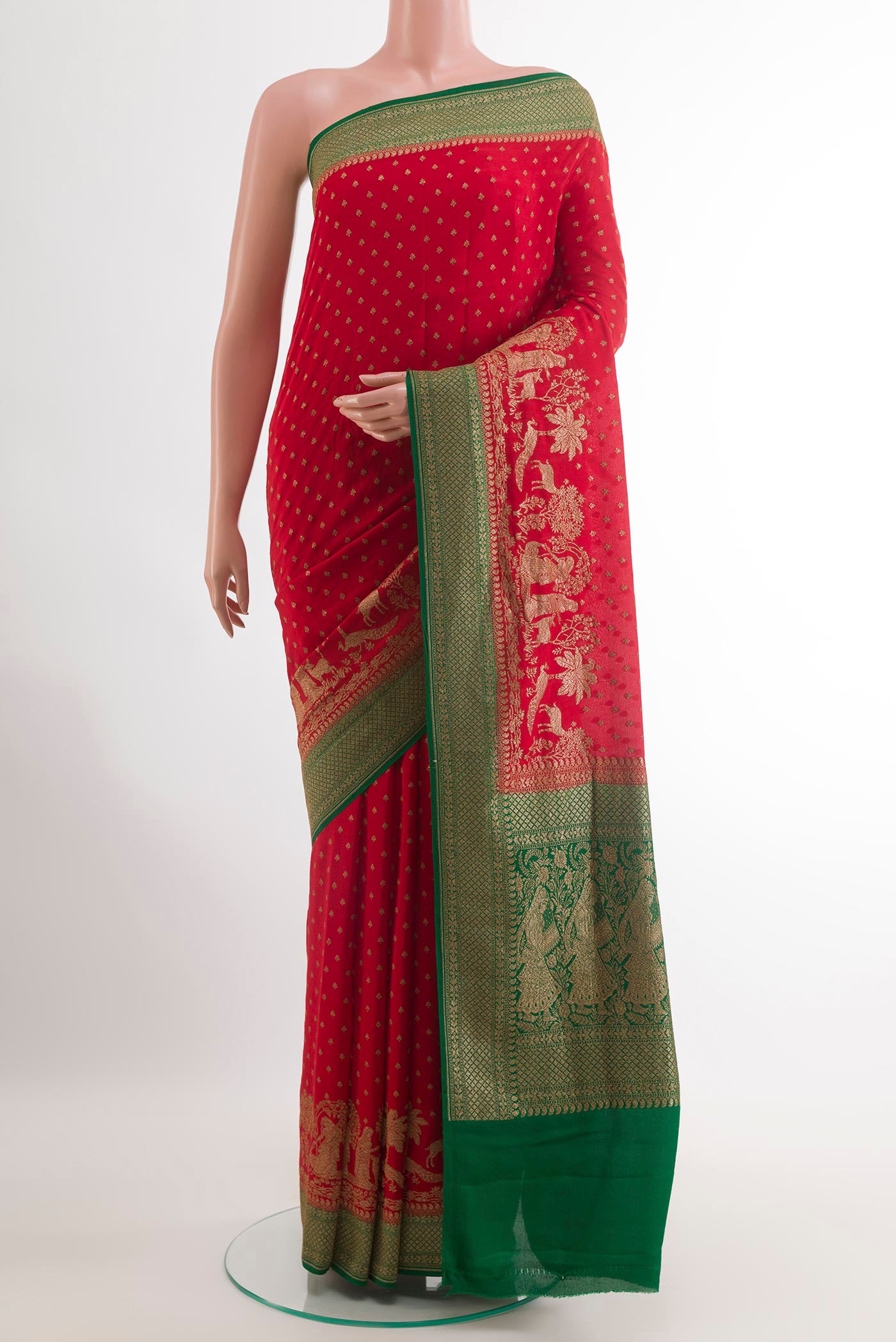 Red Banarasi Georgette Saree with Zari Butta on the body and Zari Border.  displayed on a mannequin