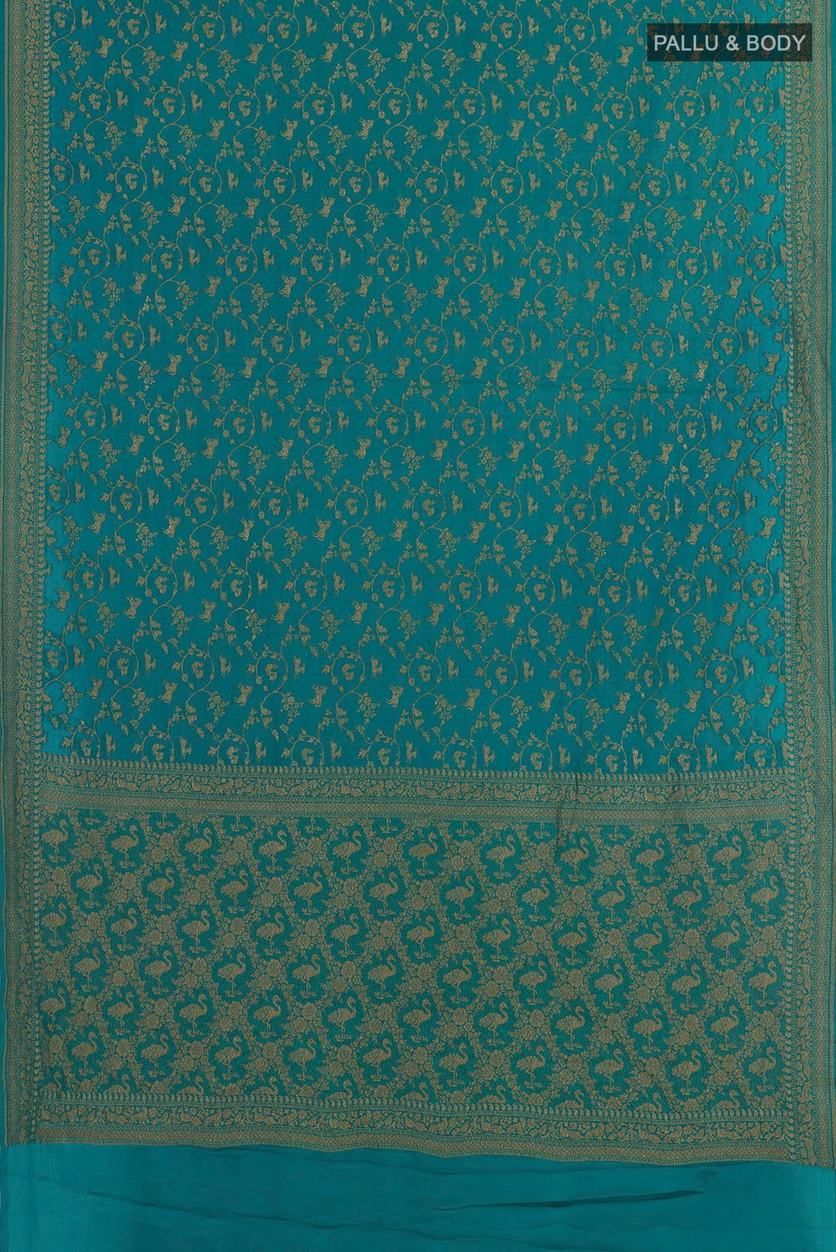 Flat view of Teal Banarasi Georgette Saree with Zari Brocade on the body and Zari Border. 