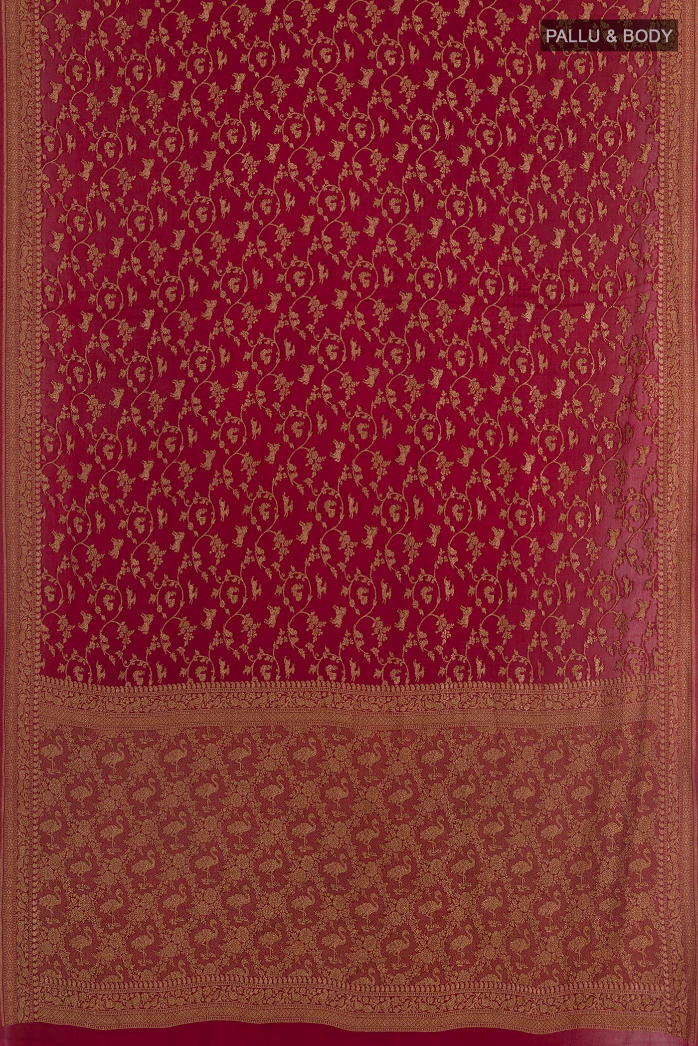 Flat view of Maroon Banarasi Georgette Saree with Zari Brocade on the body and Zari Border. 