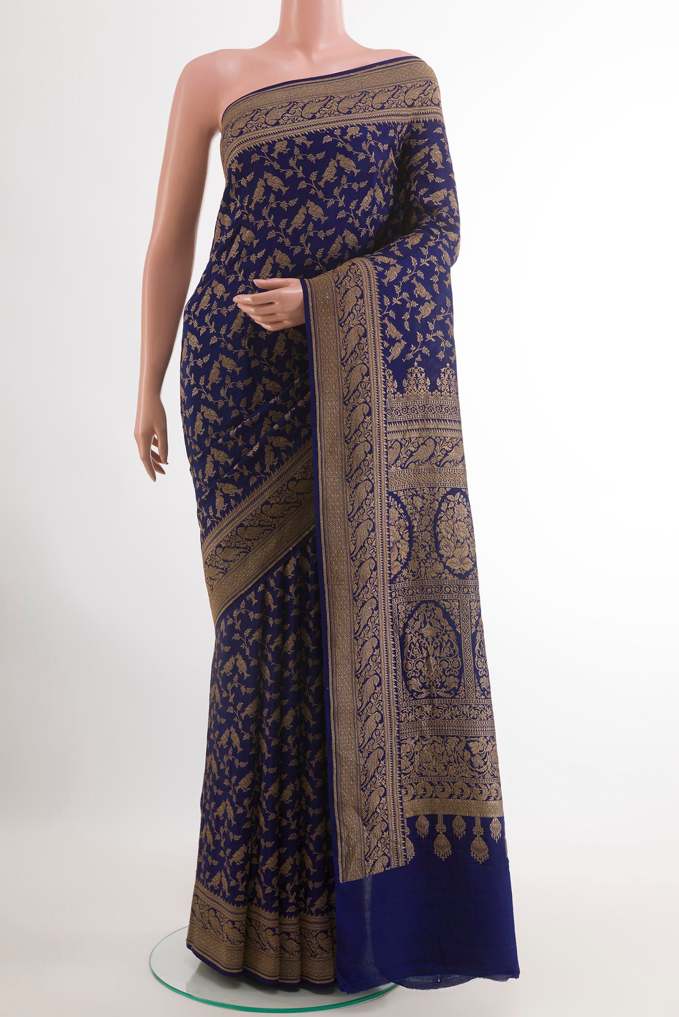 Blue Banarasi Georgette Saree with Zari Brocade on the body and Zari Border.  displayed on a mannequin