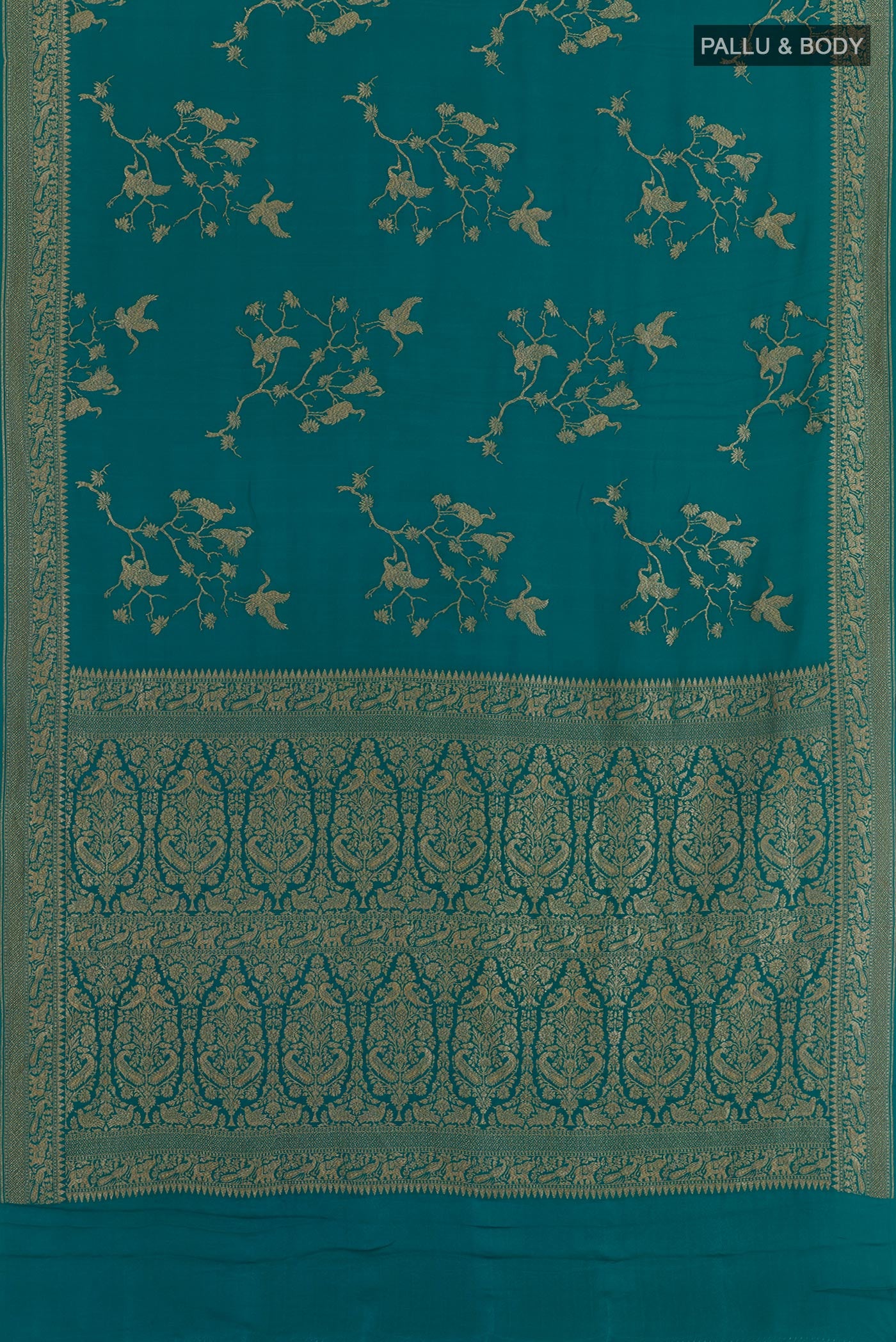 Flat view of Sea Green Banarasi Georgette Saree with Zari Brocade on the body and Thread Border. 