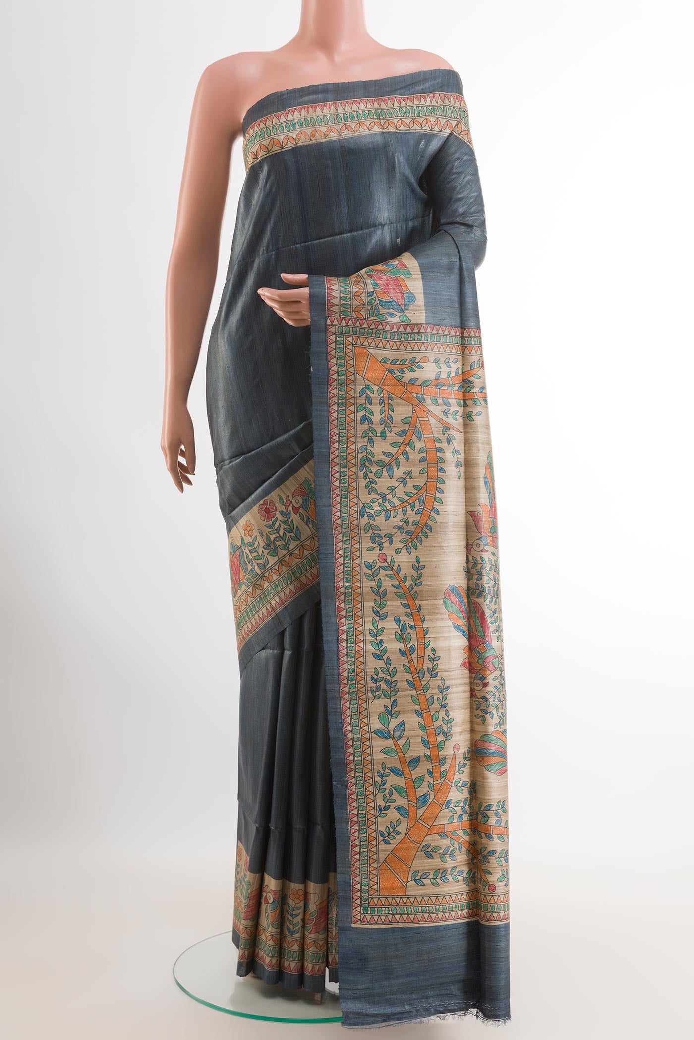Blue Tussar Saree with Plain Body and Printed Border.  displayed on a mannequin