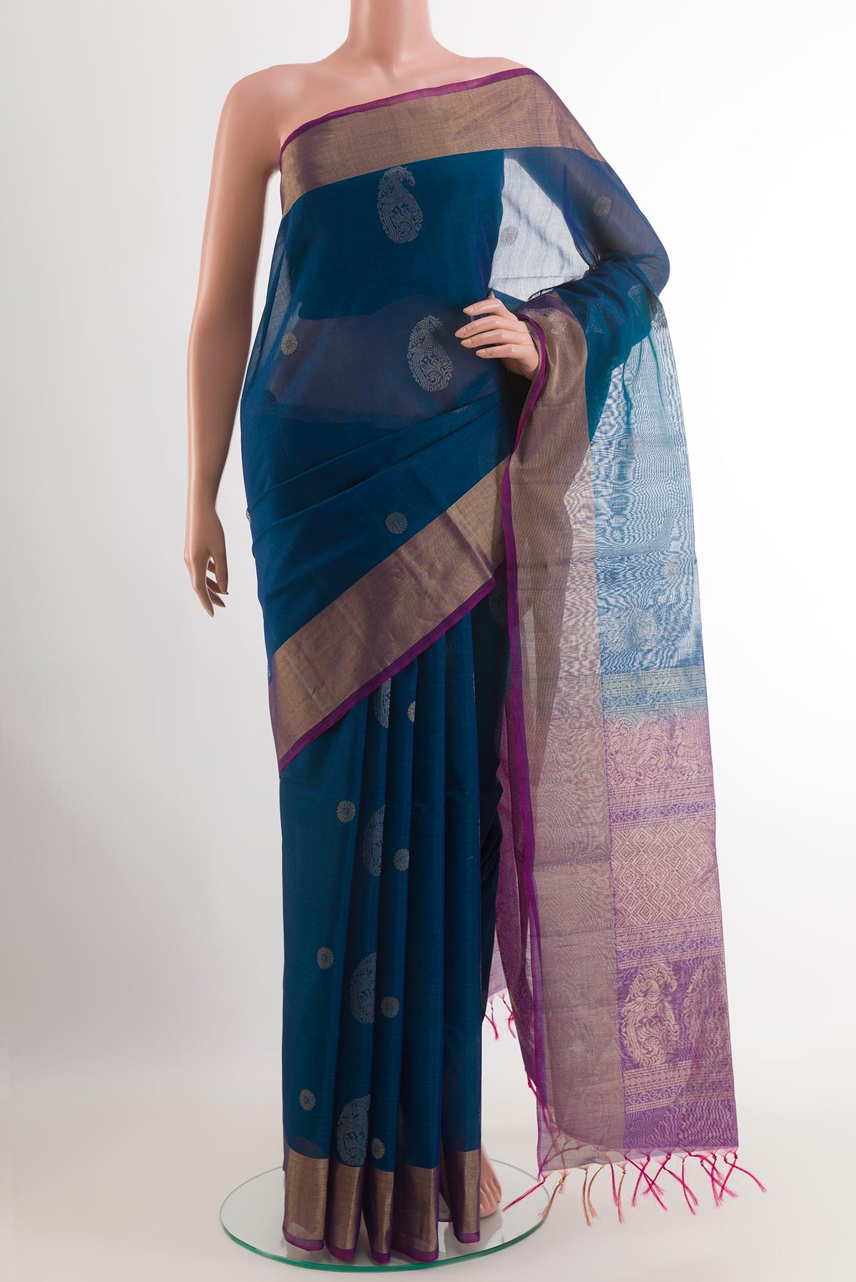 Blue Blended Kora Cotton Saree with Zari Butta on the body and Zari Border.  displayed on a mannequin