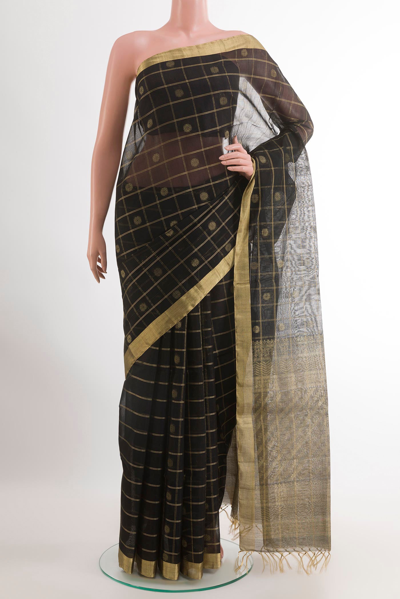 Black Blended Kora Cotton Saree with Zari Butta on the body and Zari Border.  displayed on a mannequin