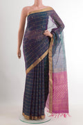 Teal Blended Kora Cotton Saree with Checked design on the body and Zari Border.  displayed on a mannequin