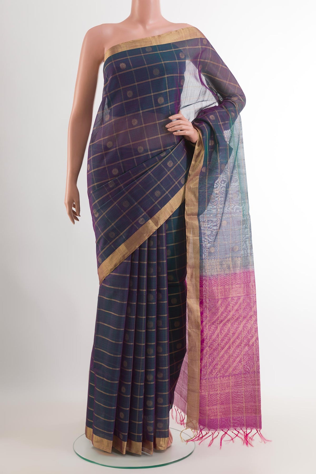 Teal Blended Kora Cotton Saree with Checked design on the body and Zari Border.  displayed on a mannequin