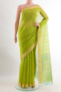 Green Blended Kora Cotton Saree with Stripes on the body and Zari Border.  displayed on a mannequin