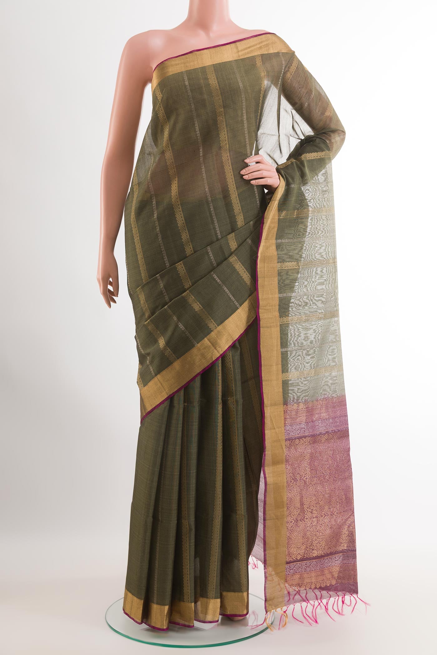 Davys Grey Blended Kora Cotton Saree with Zari Butta on the body and Zari Border.  displayed on a mannequin