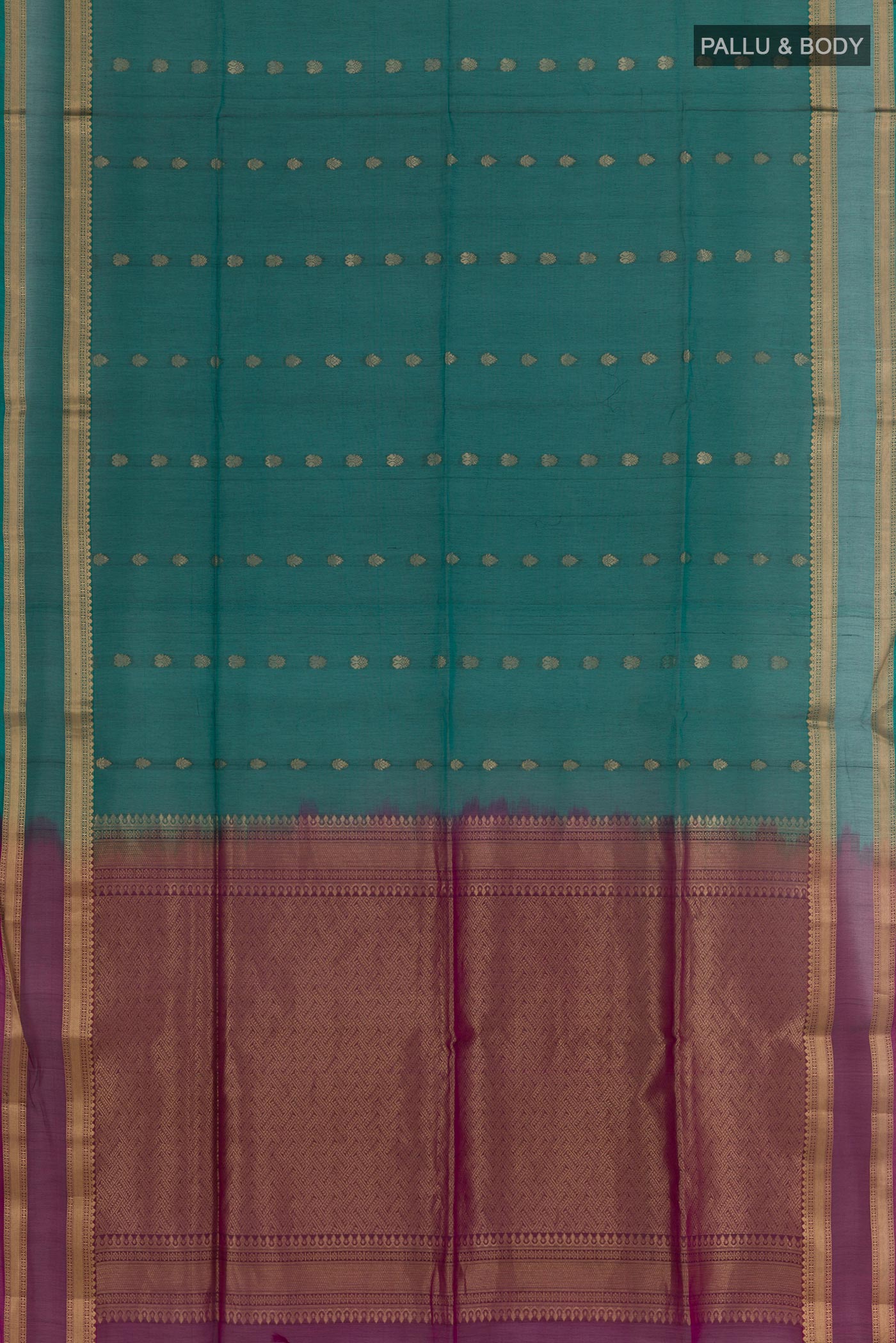 Flat view of Bottle Green Blended Kora Cotton Saree with Zari Butta on the body and Zari Border. 