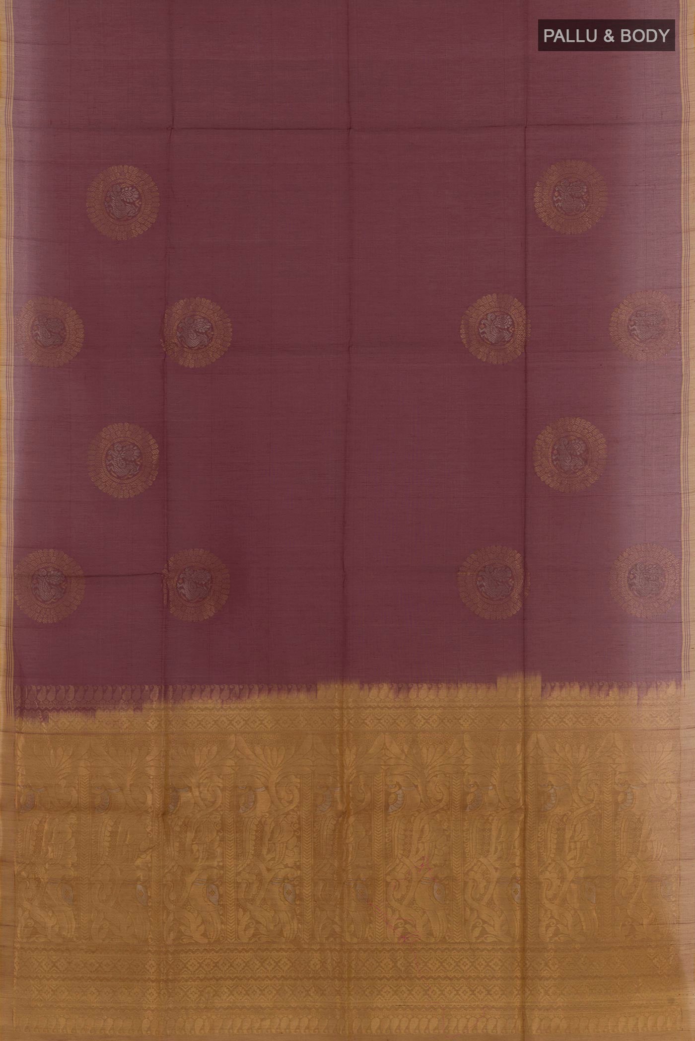 Flat view of Brown Blended Kora Cotton Saree with Zari Butta on the body and Zari Border. 