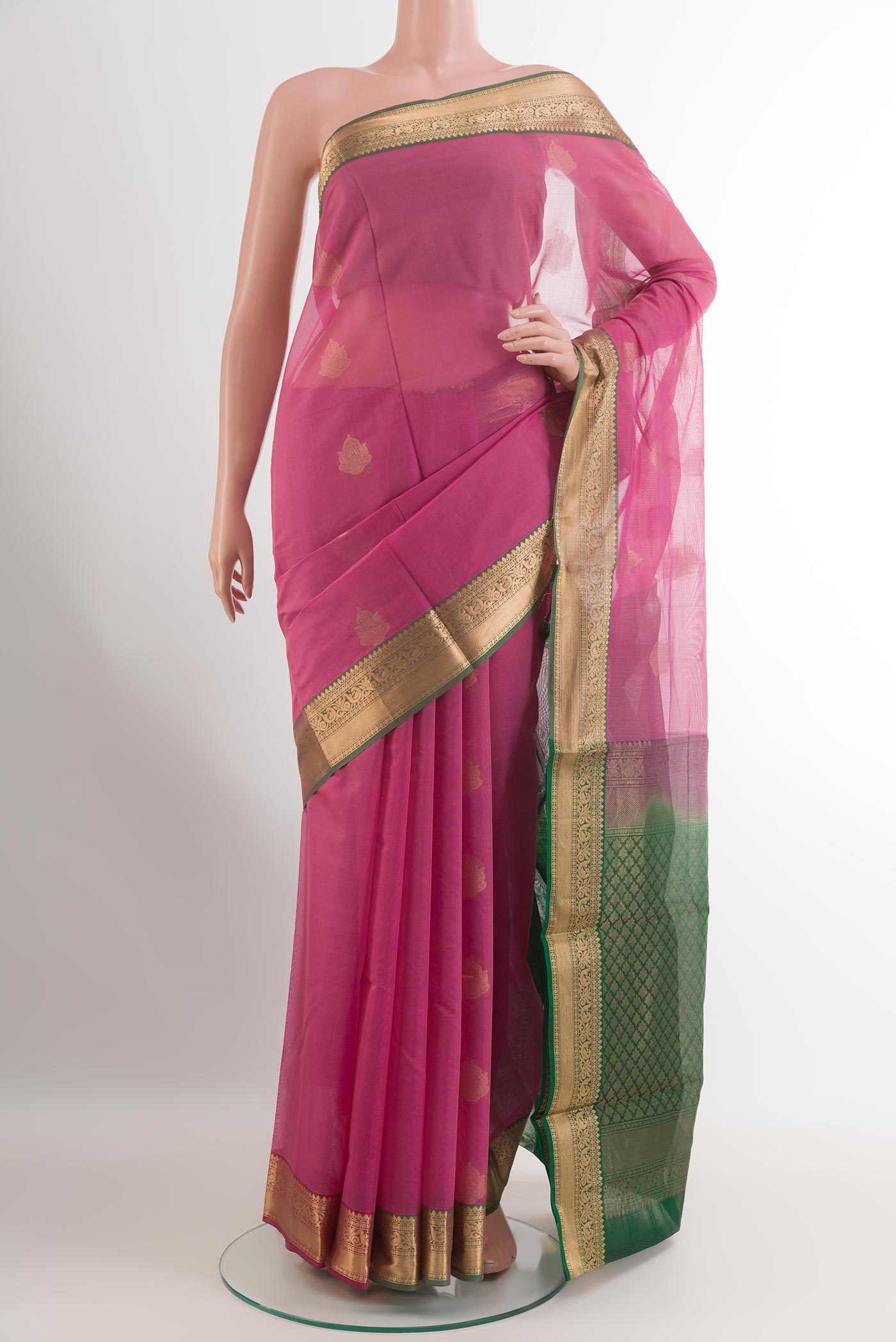 Pink Blended Kora Cotton Saree with Zari Butta on the body and Zari Border.  displayed on a mannequin