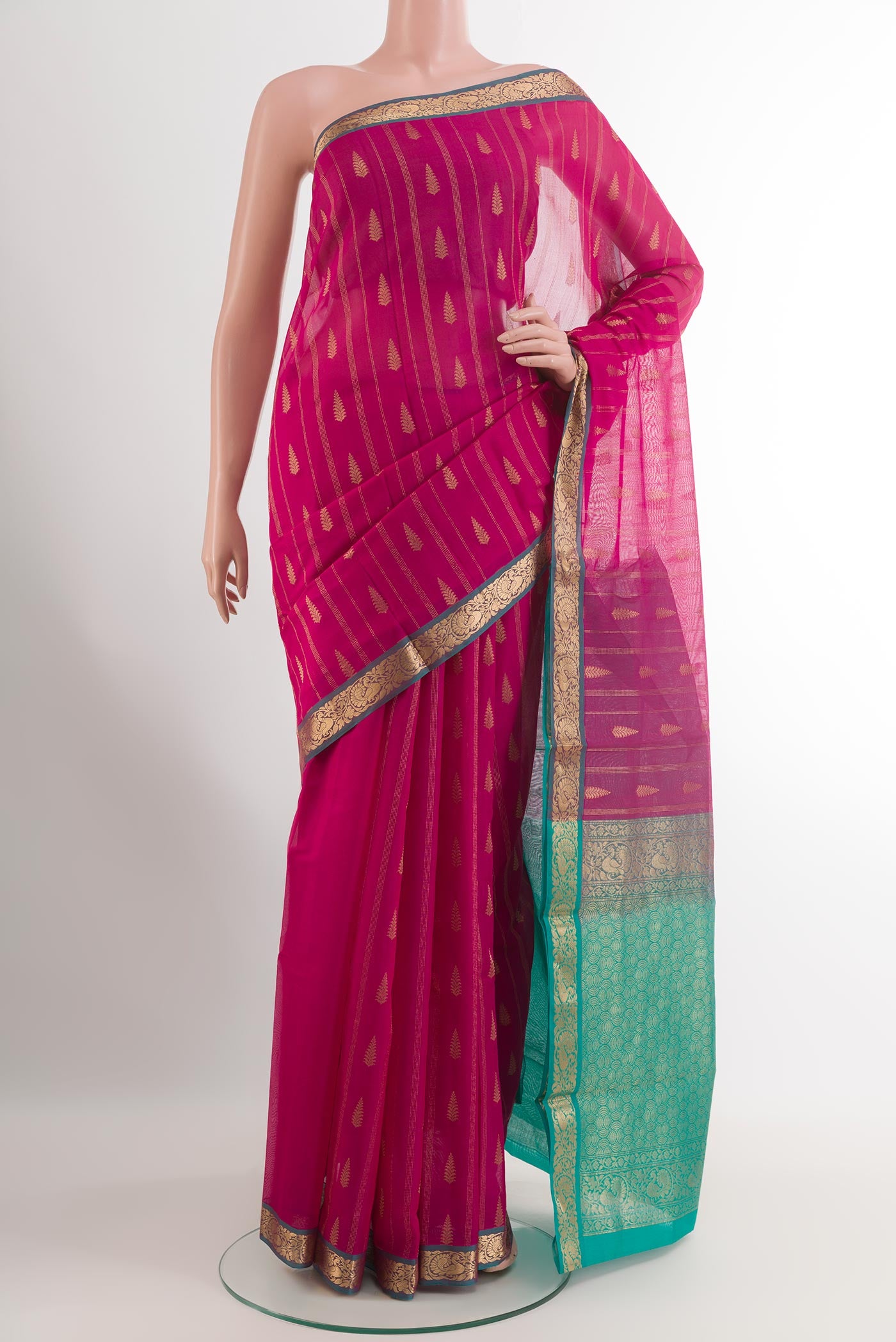 Pink Blended Kora Cotton Saree with Zari Butta on the body and Zari Border.  displayed on a mannequin