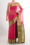 Pink Blended Kora Cotton Saree with Zari Butta on the body and Zari Border.  displayed on a mannequin