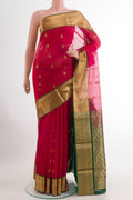 Pink Blended Kora Cotton Saree with Zari Butta on the body and Zari Border.  displayed on a mannequin
