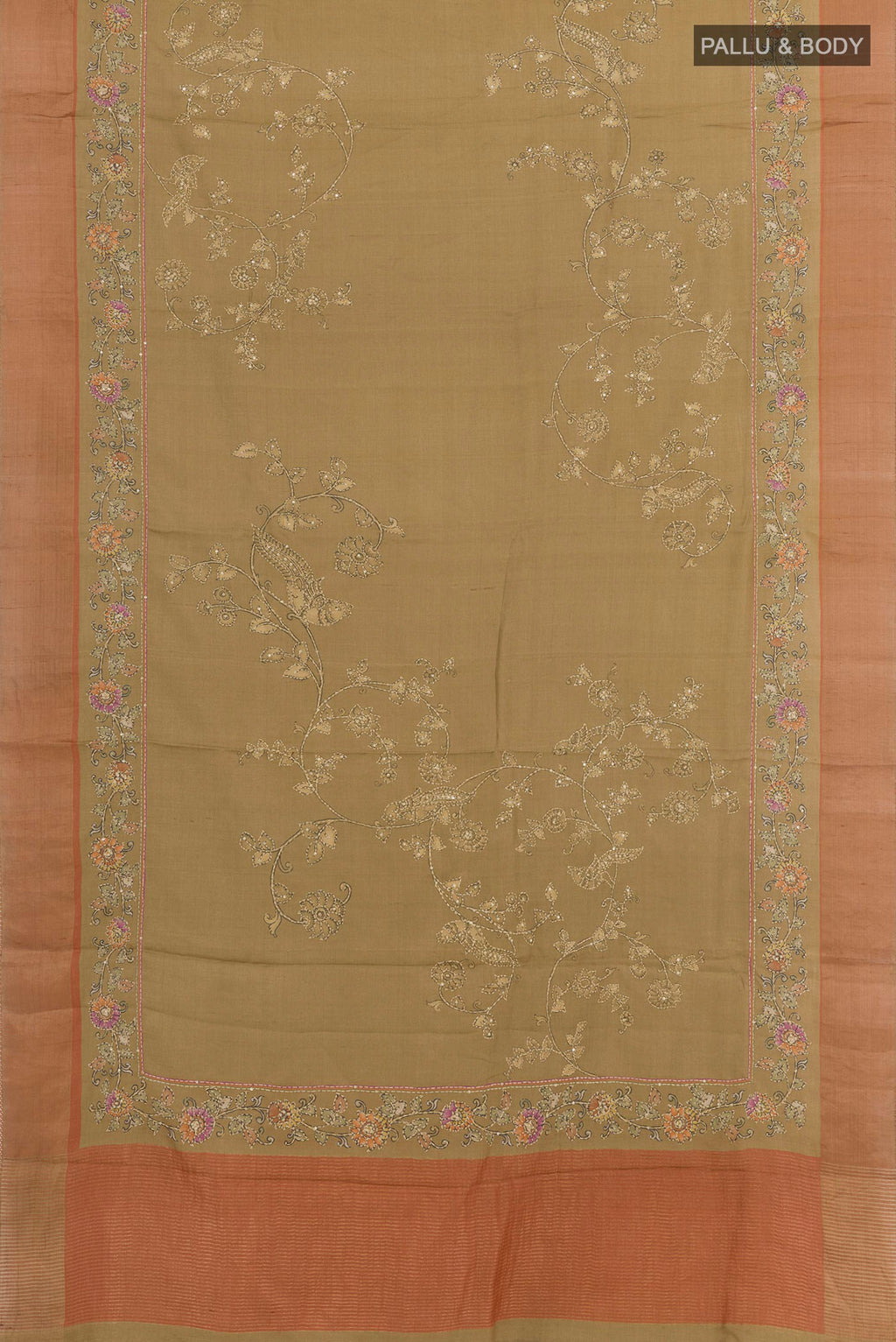 Flat view of Beige Tussar Saree with Embroidery on the body and Zari Border. 