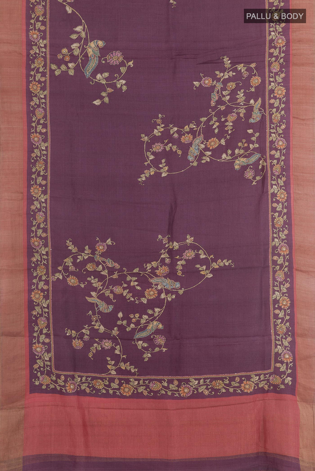 Flat view of Purple Tussar Saree with Printed design on the body and Zari Border. 