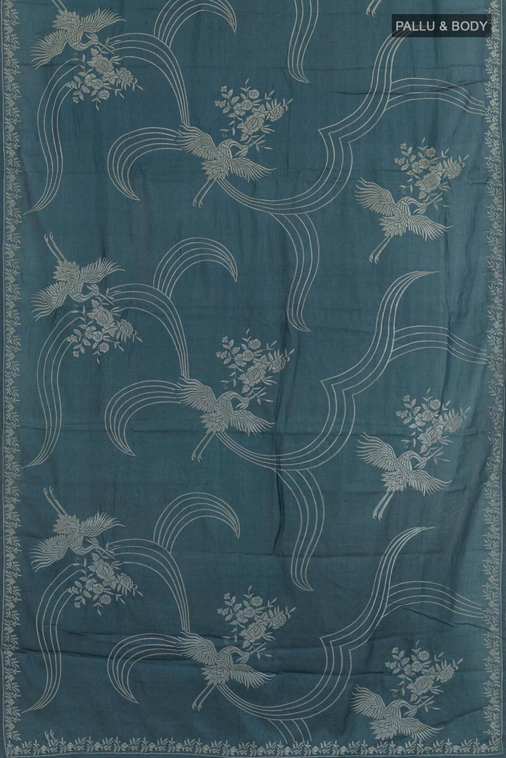 Flat view of Blue Grey Tussar Saree with Embroidery on the body and Embroidery Border. 