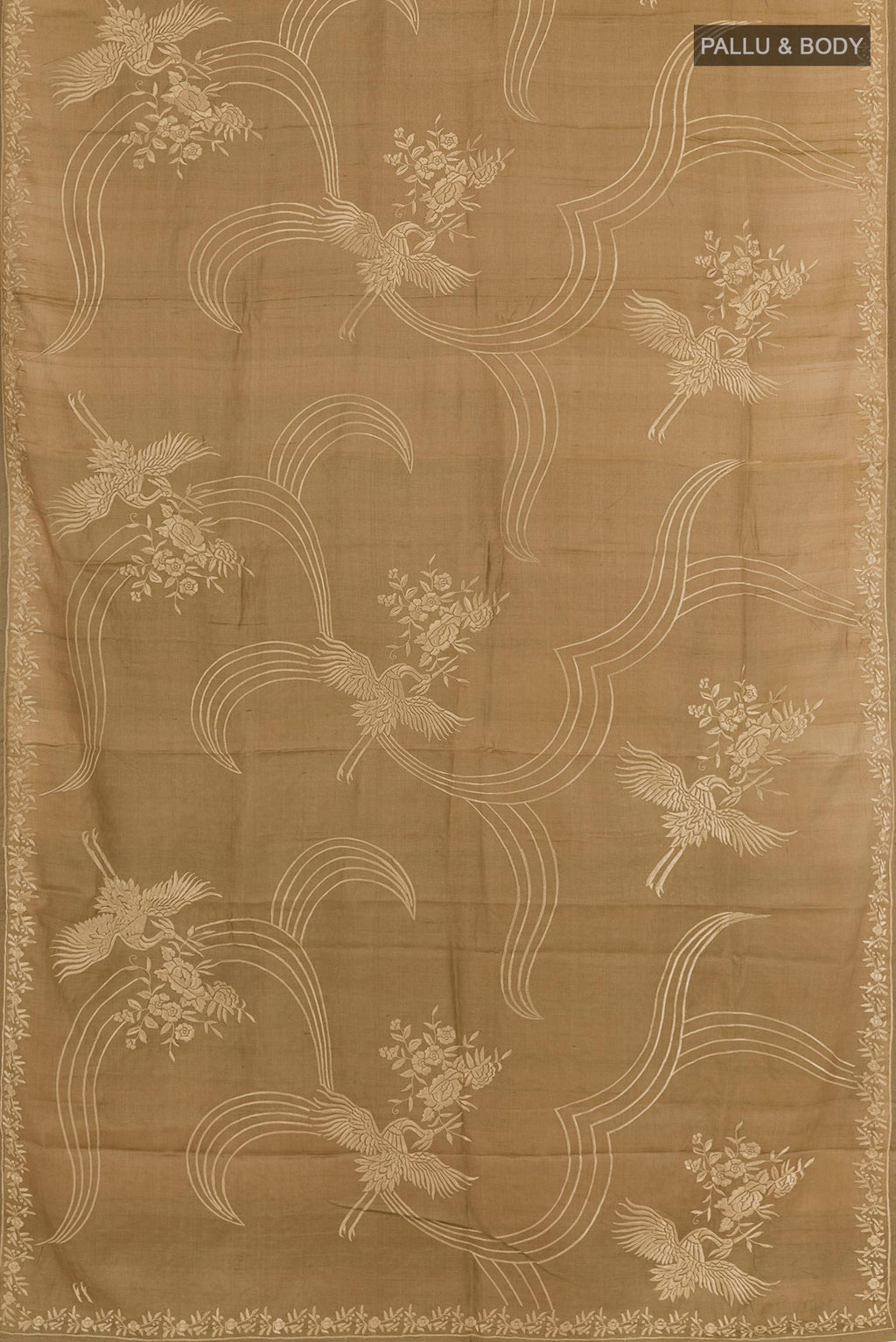 Flat view of Beige Tussar Saree with Embroidery on the body and Embroidery Border. 