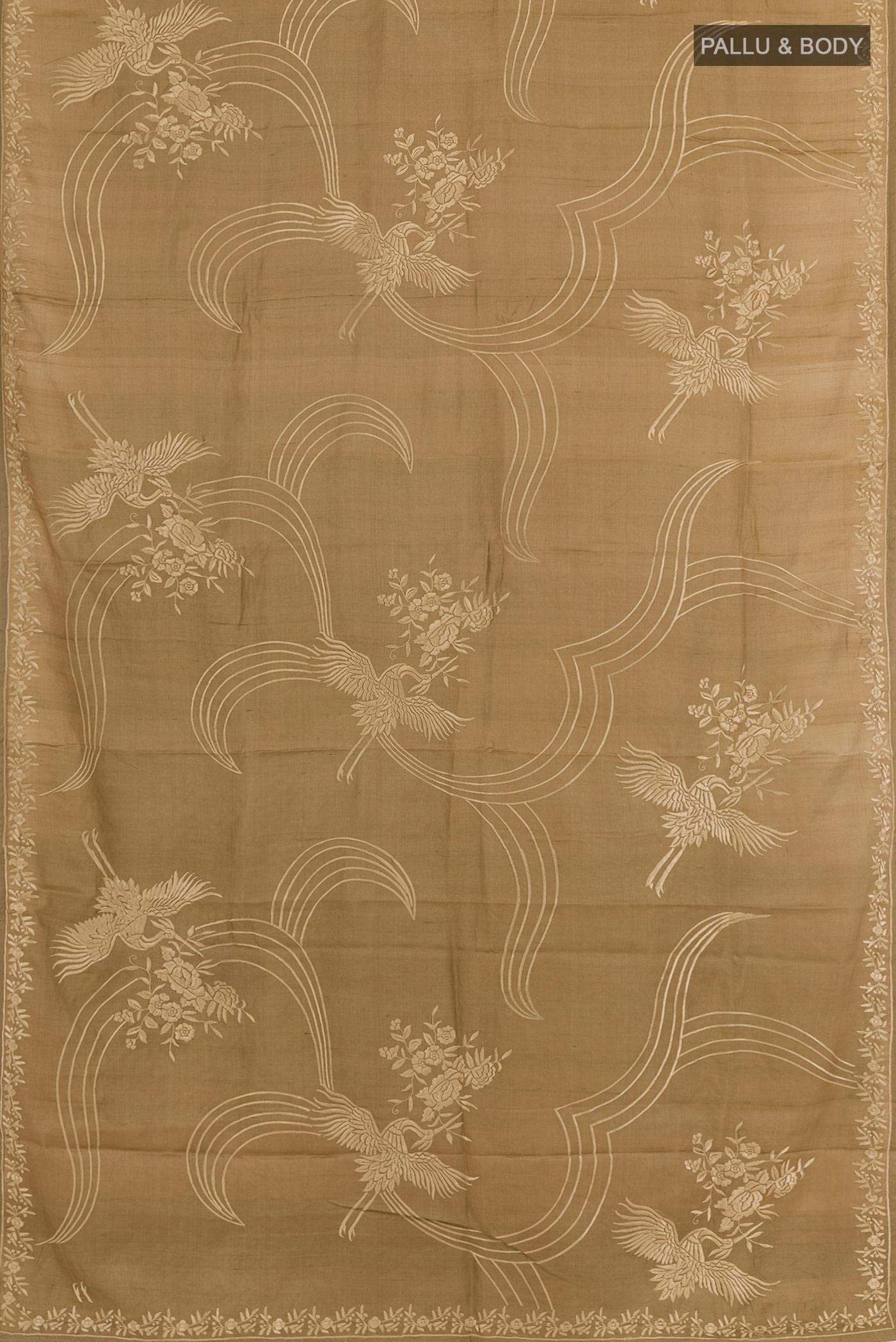 Flat view of Beige Tussar Saree with Embroidery on the body and Embroidery Border. 
