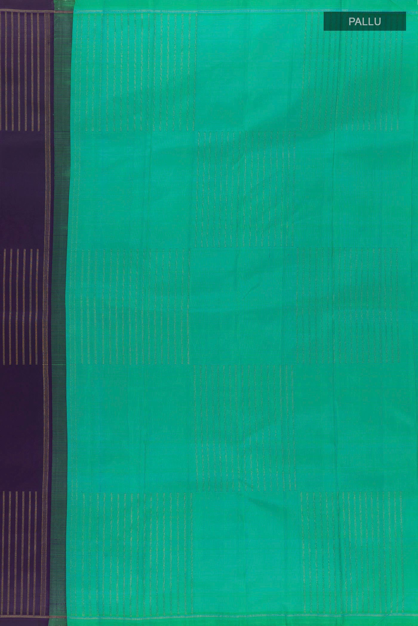 Close up image of the pallu of Purple Kanchipuram Silk Saree with Zari Butta on the body and Zari Border. 