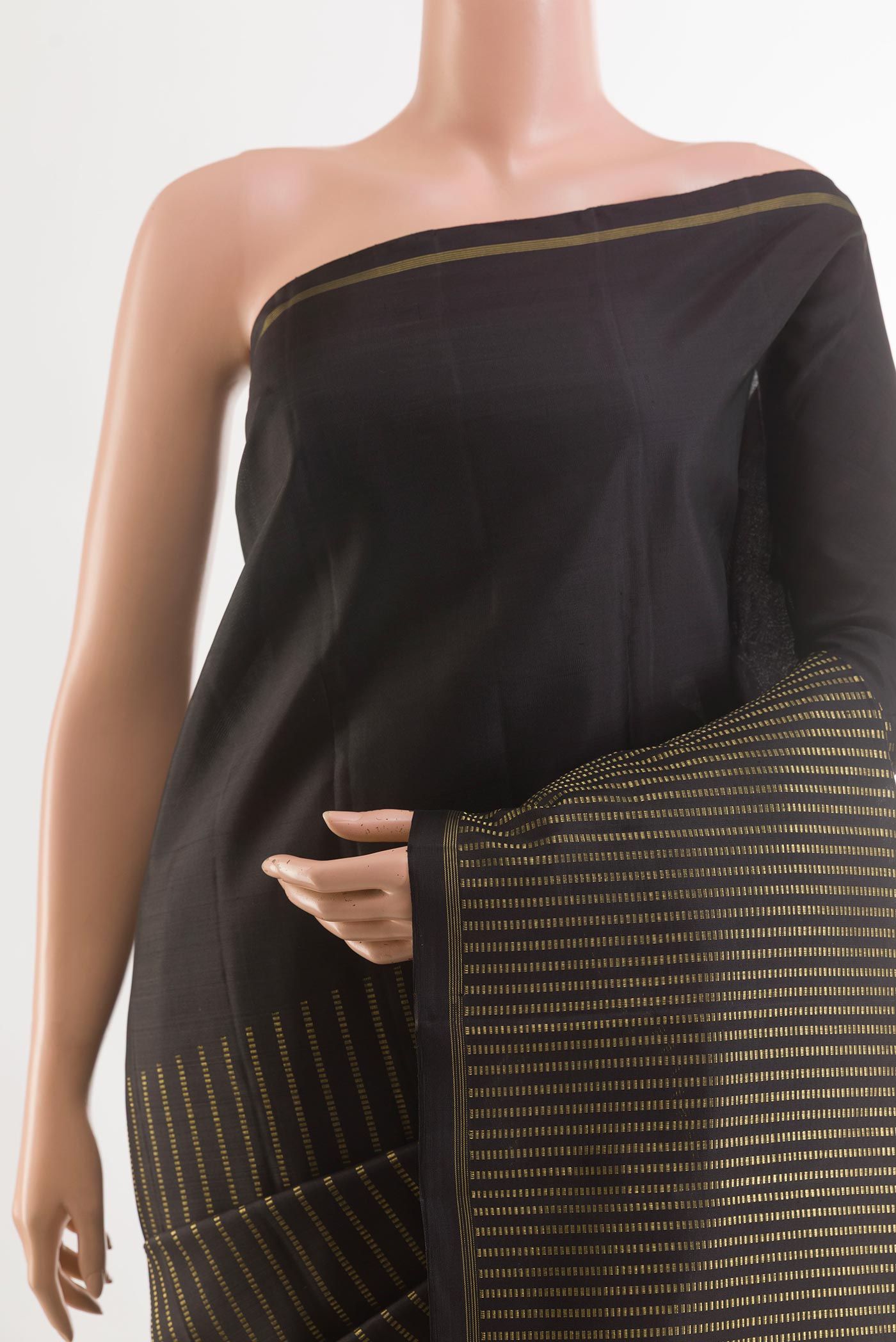 Border image of Black Kanchipuram Silk Saree with Stripes on the body and Zari Border. 