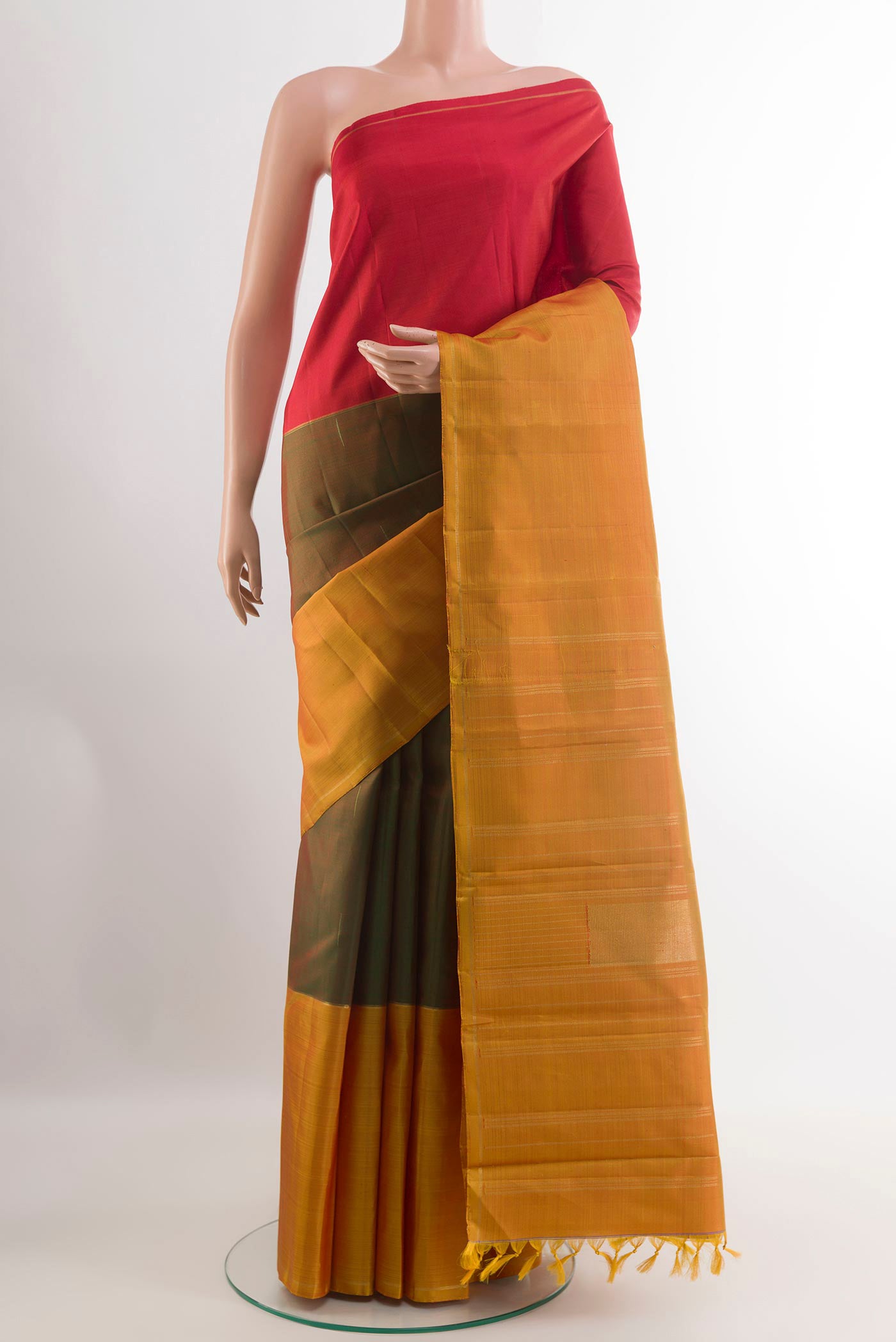 Multi Color Kanjivaram Silk Saree with Stripes on the body and Zari Border.  displayed on a mannequin