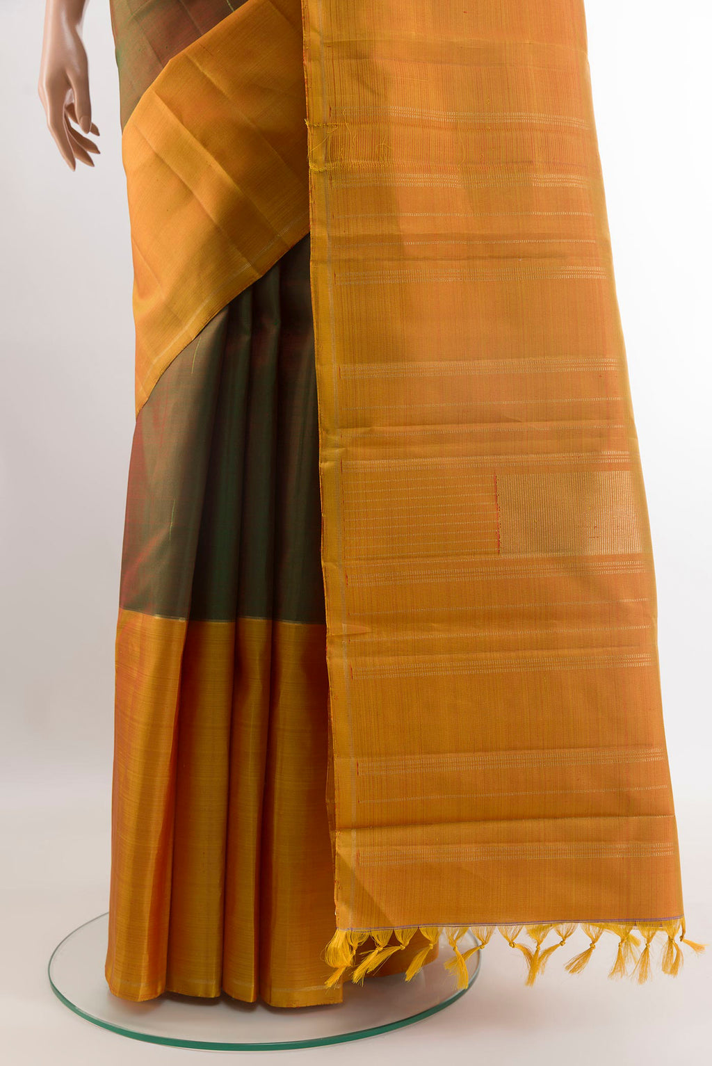 Pleats and pallu of Multi Color Kanjivaram Silk Saree with Stripes on the body and Zari Border. 