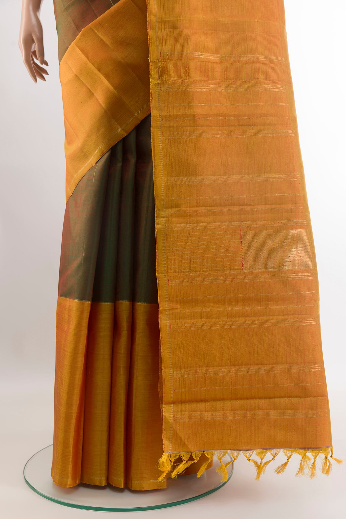 Pleats and pallu of Multi Color Kanjivaram Silk Saree with Stripes on the body and Zari Border. 