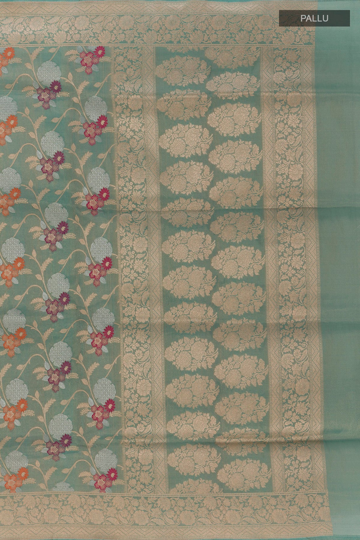 Close up image of the pallu of Light Blue Banarasi Tissue Saree with Zari Brocade on the body and Zari Border. 