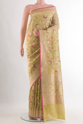 Pure Silk Golden Banarasi Saree with Zari Brocade on the body and Zari Border.  displayed on a mannequin