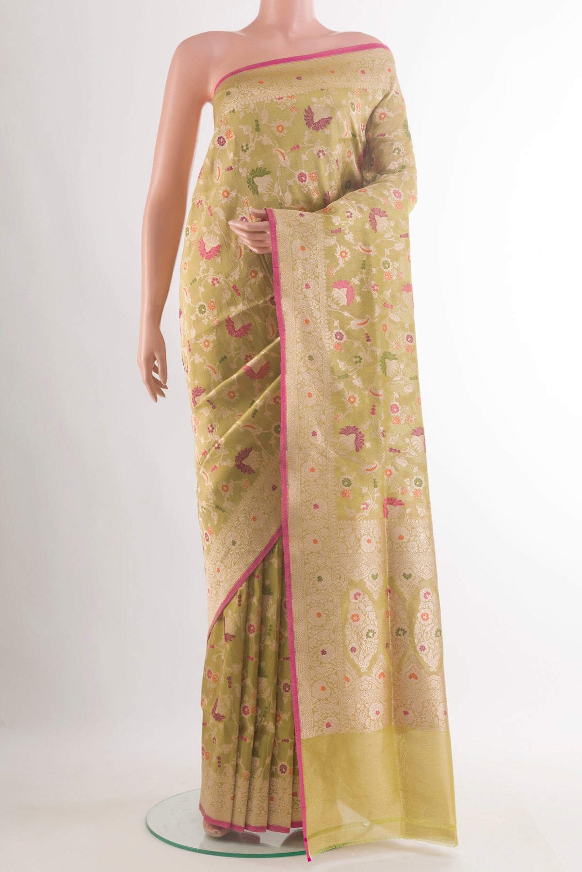Pure Silk Golden Banarasi Saree with Zari Brocade on the body and Zari Border.  displayed on a mannequin