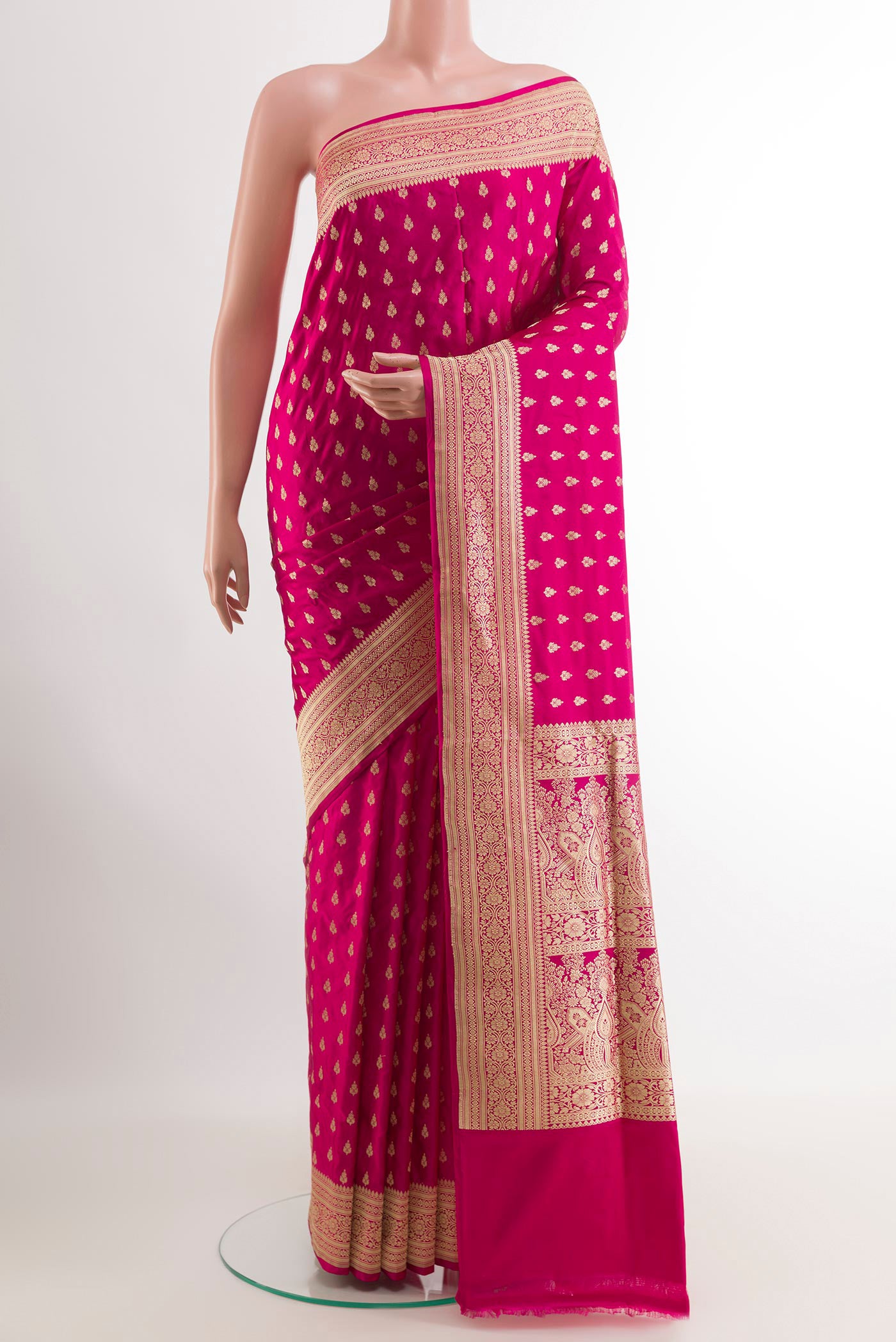 Pink Banarasi Silk Saree with Zari Butta on the body and Zari Border.  displayed on a mannequin