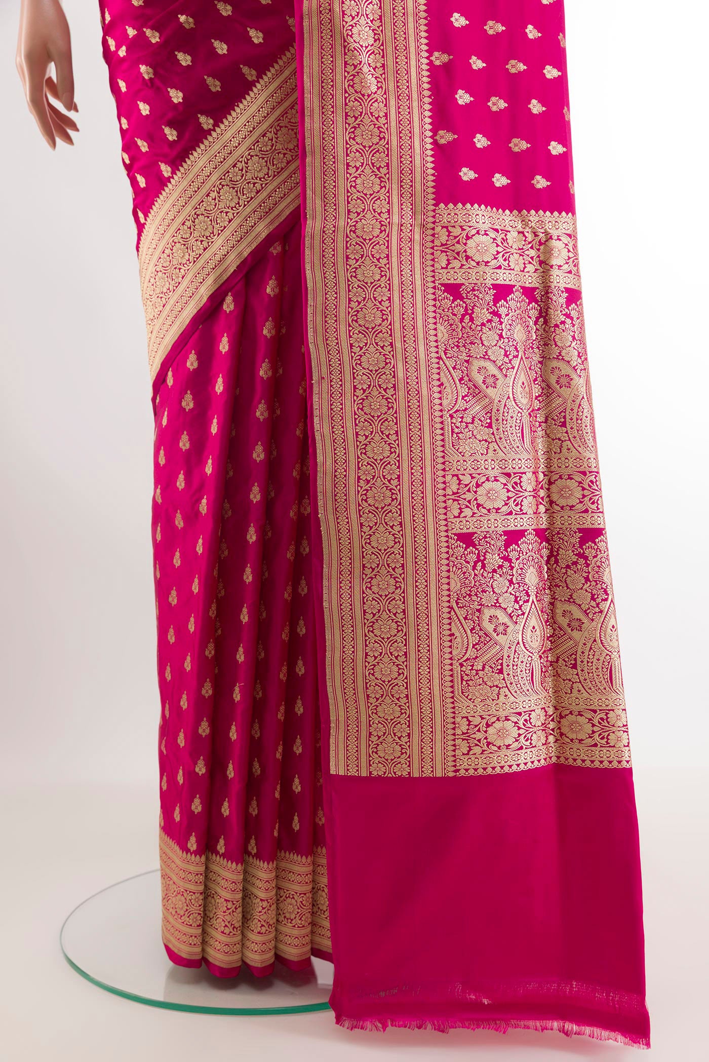 Pleats and pallu of Pink Banarasi Silk Saree with Zari Butta on the body and Zari Border. 