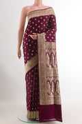 Purple Banarasi Silk Saree with Zari Butta on the body and Zari Border.  displayed on a mannequin