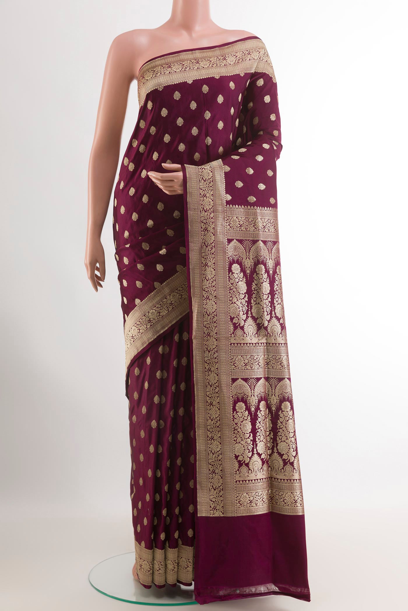 Purple Banarasi Silk Saree with Zari Butta on the body and Zari Border.  displayed on a mannequin