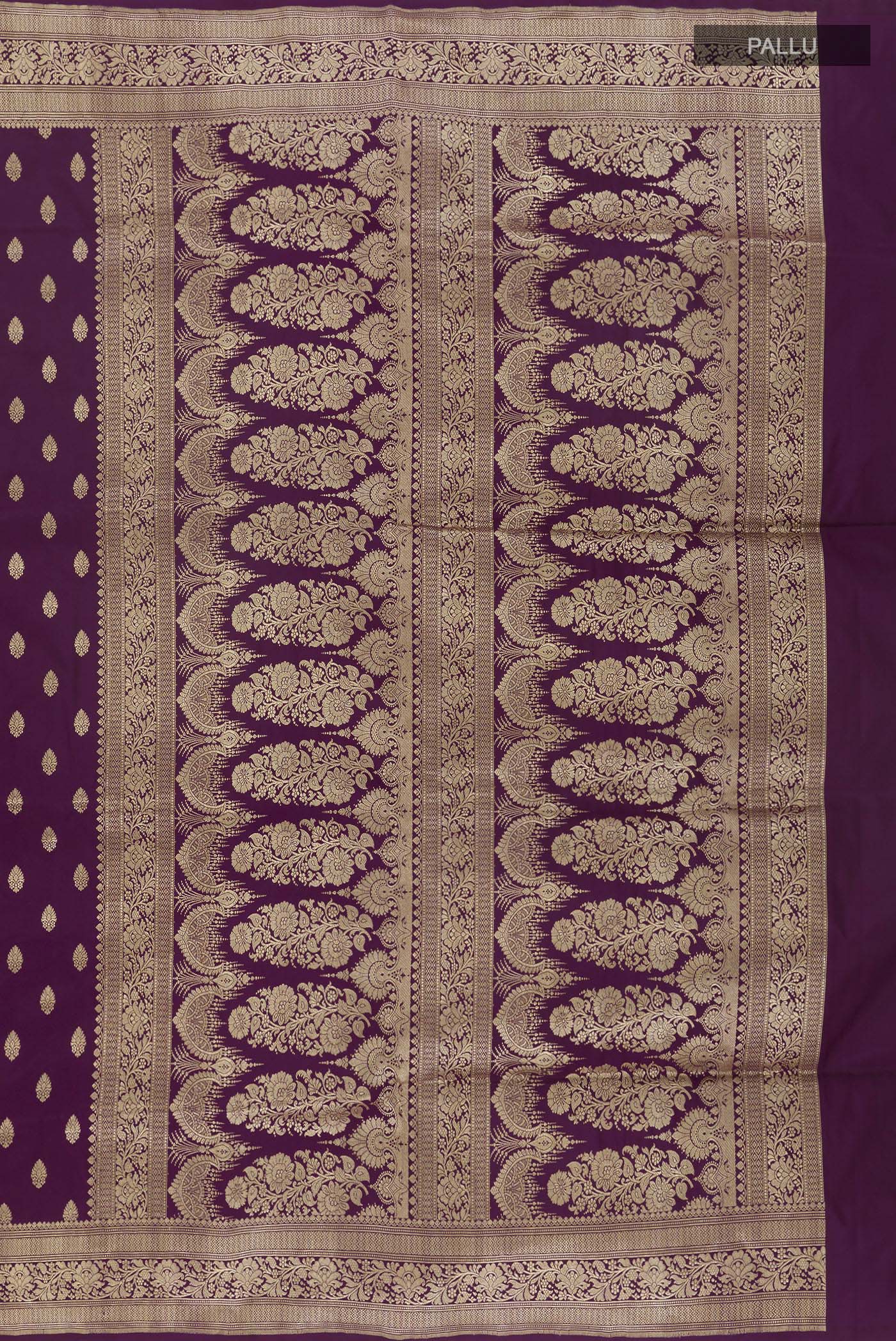 Close up image of the pallu of Purple Banarasi Silk Saree with Zari Butta on the body and Zari Border. 
