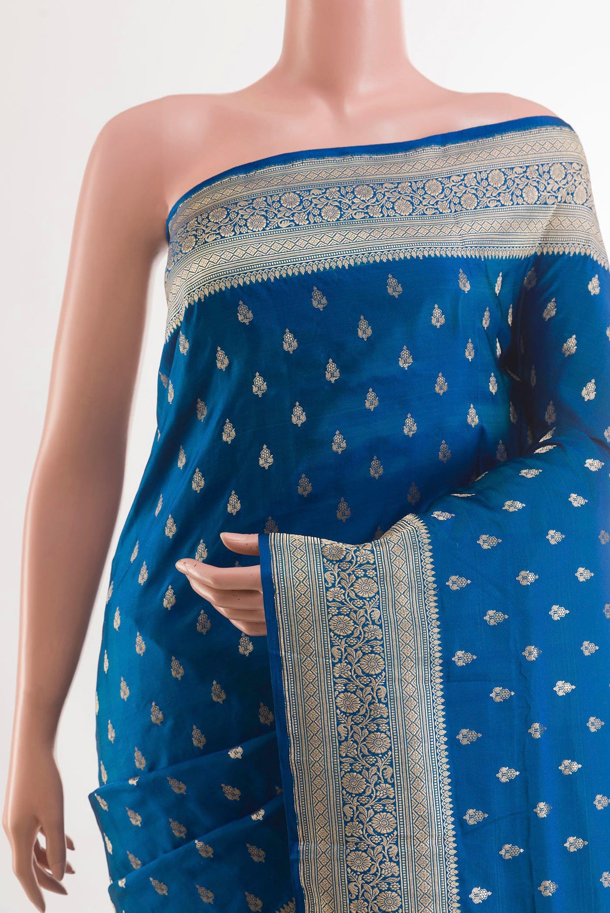 Border image of Blue Banarasi Silk Saree with Zari Butta on the body and Zari Border. 