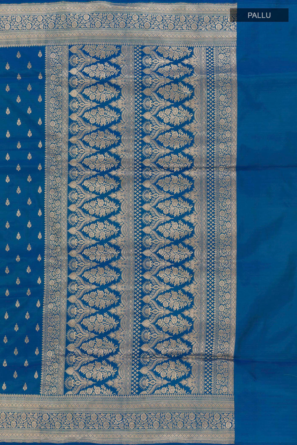 Close up image of the pallu of Blue Banarasi Silk Saree with Zari Butta on the body and Zari Border. 