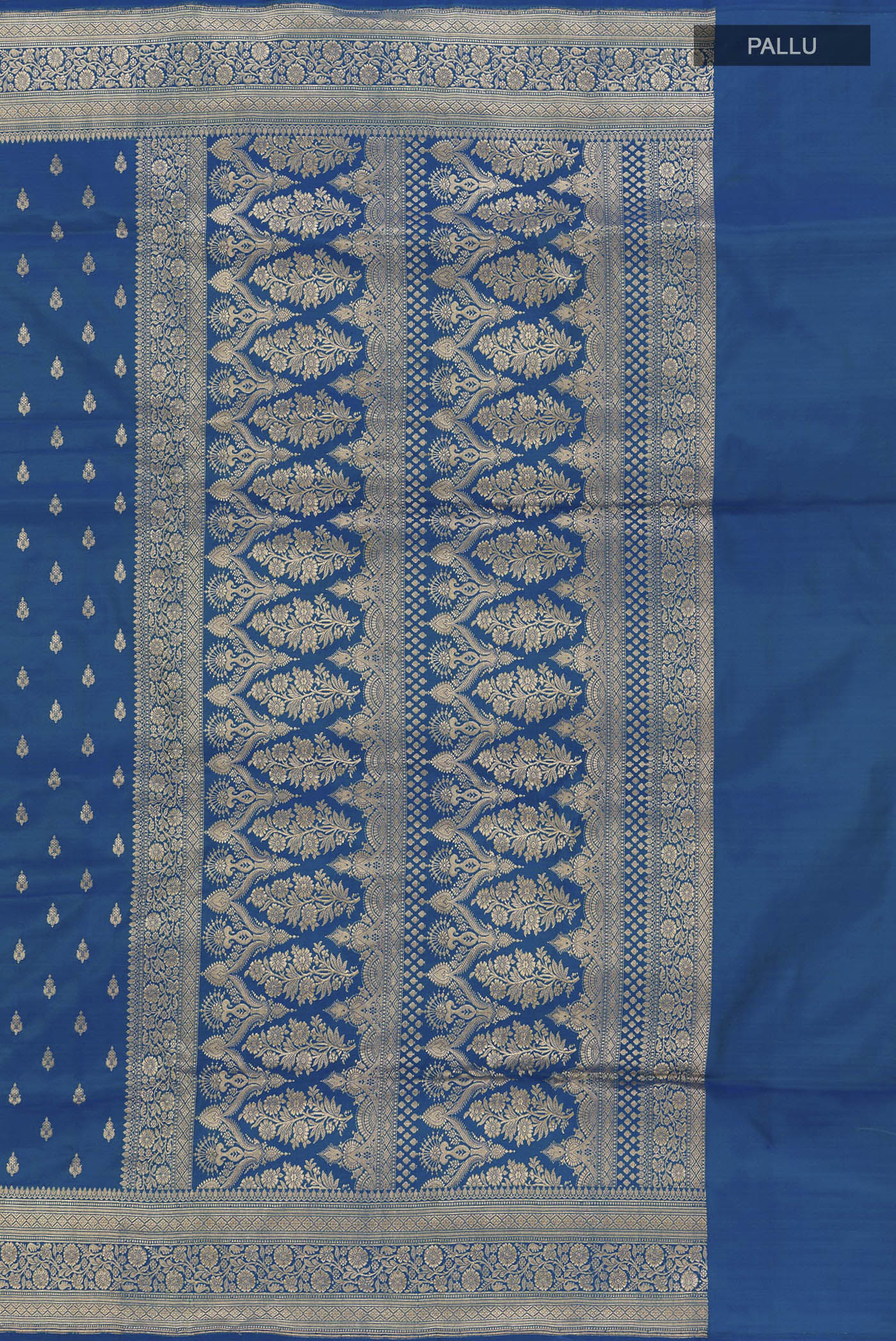 Close up image of the pallu of Blue Banarasi Silk Saree with Zari Butta on the body and Zari Border. 