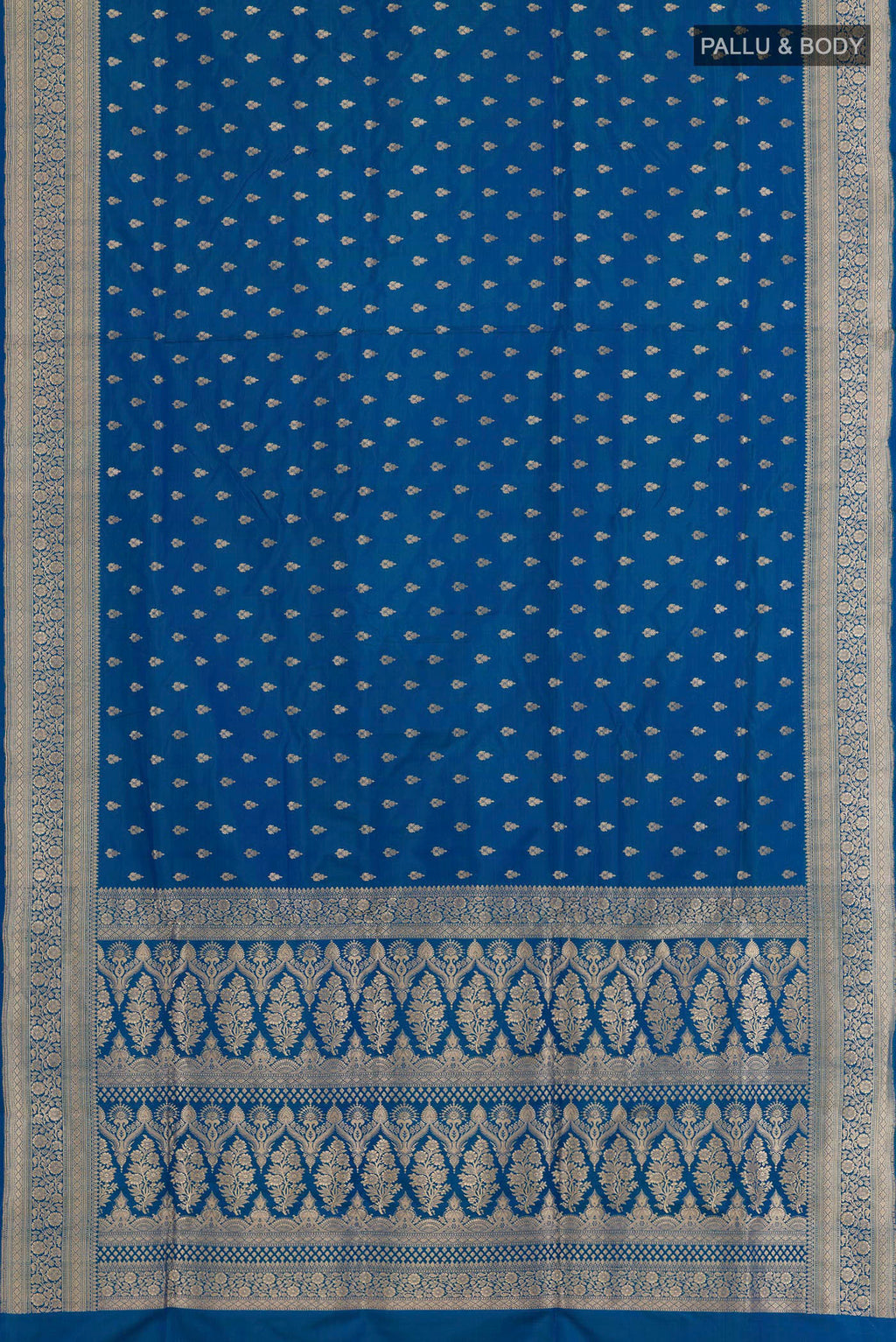 Flat view of Blue Banarasi Silk Saree with Zari Butta on the body and Zari Border. 