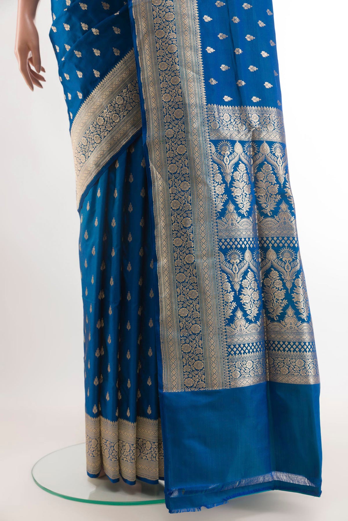 Pleats and pallu of Blue Banarasi Silk Saree with Zari Butta on the body and Zari Border. 