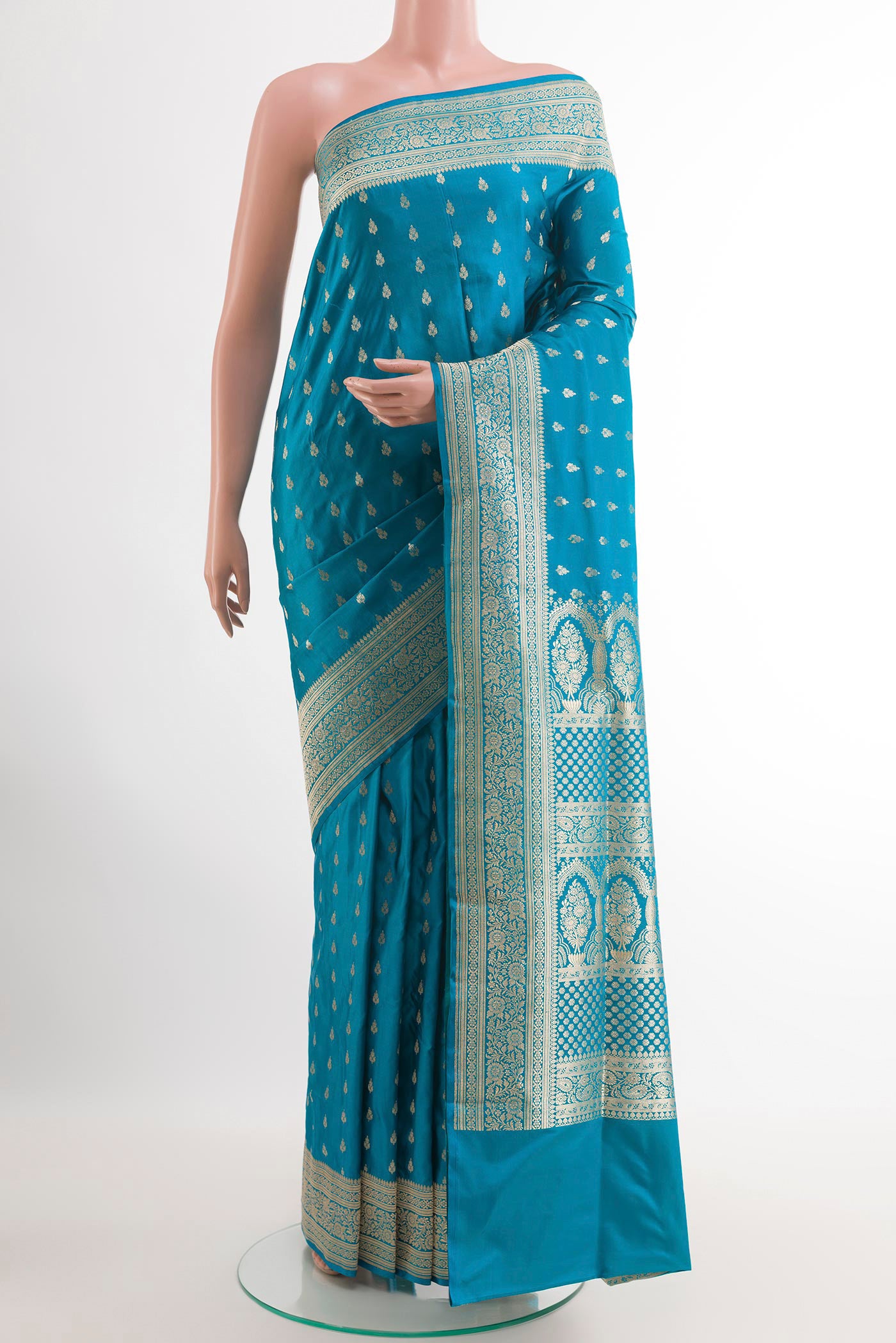 Blue Banarasi Silk Saree with Zari Butta on the body and Zari Border.  displayed on a mannequin