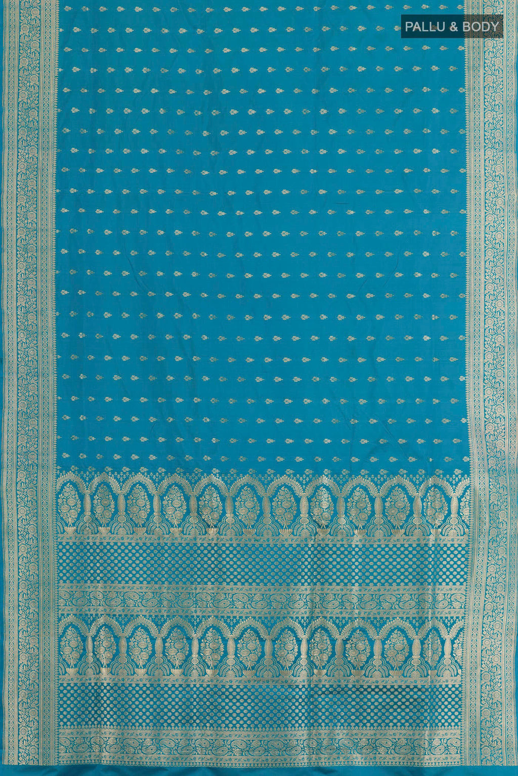 Flat view of Blue Banarasi Silk Saree with Zari Butta on the body and Zari Border. 