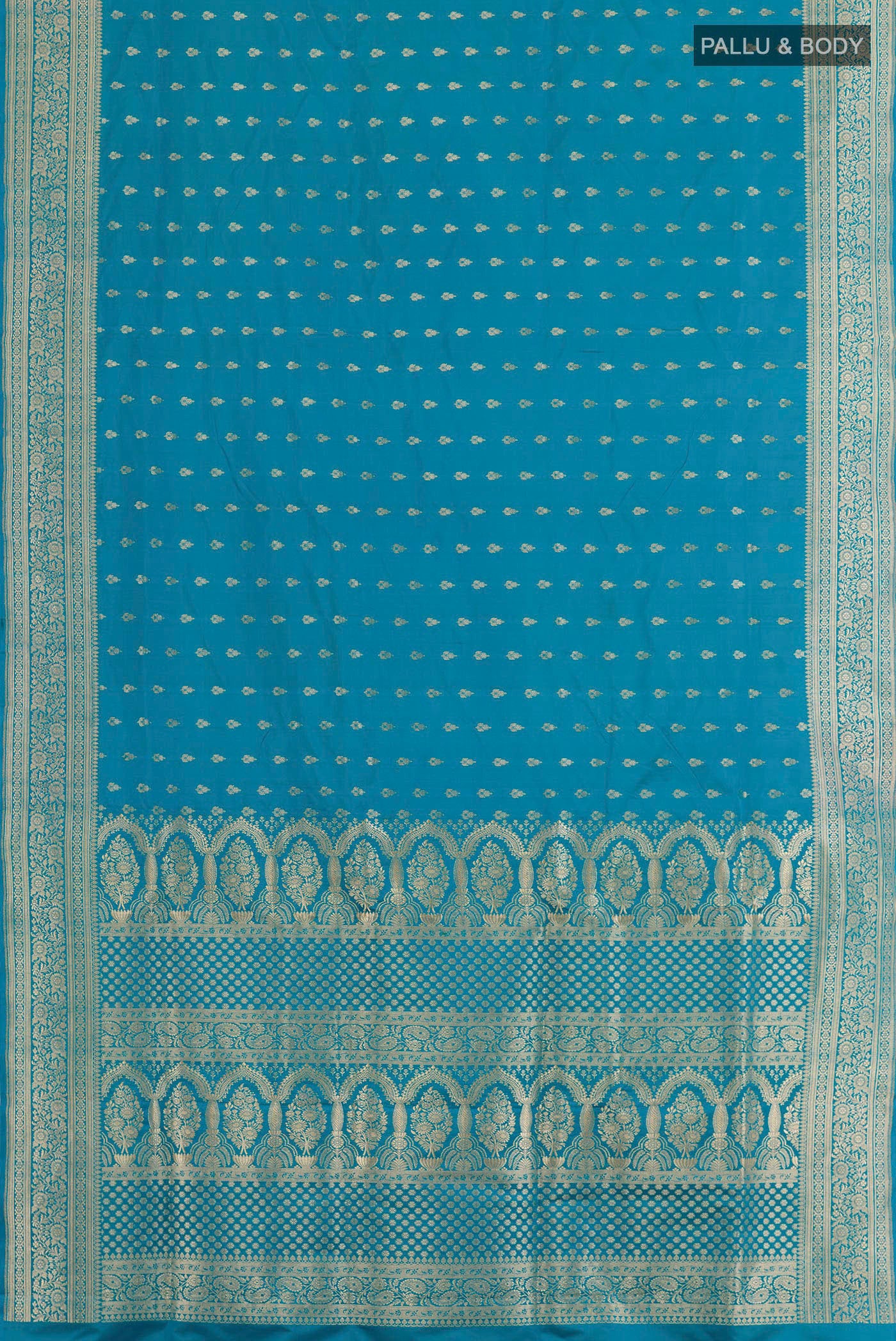 Flat view of Blue Banarasi Silk Saree with Zari Butta on the body and Zari Border. 