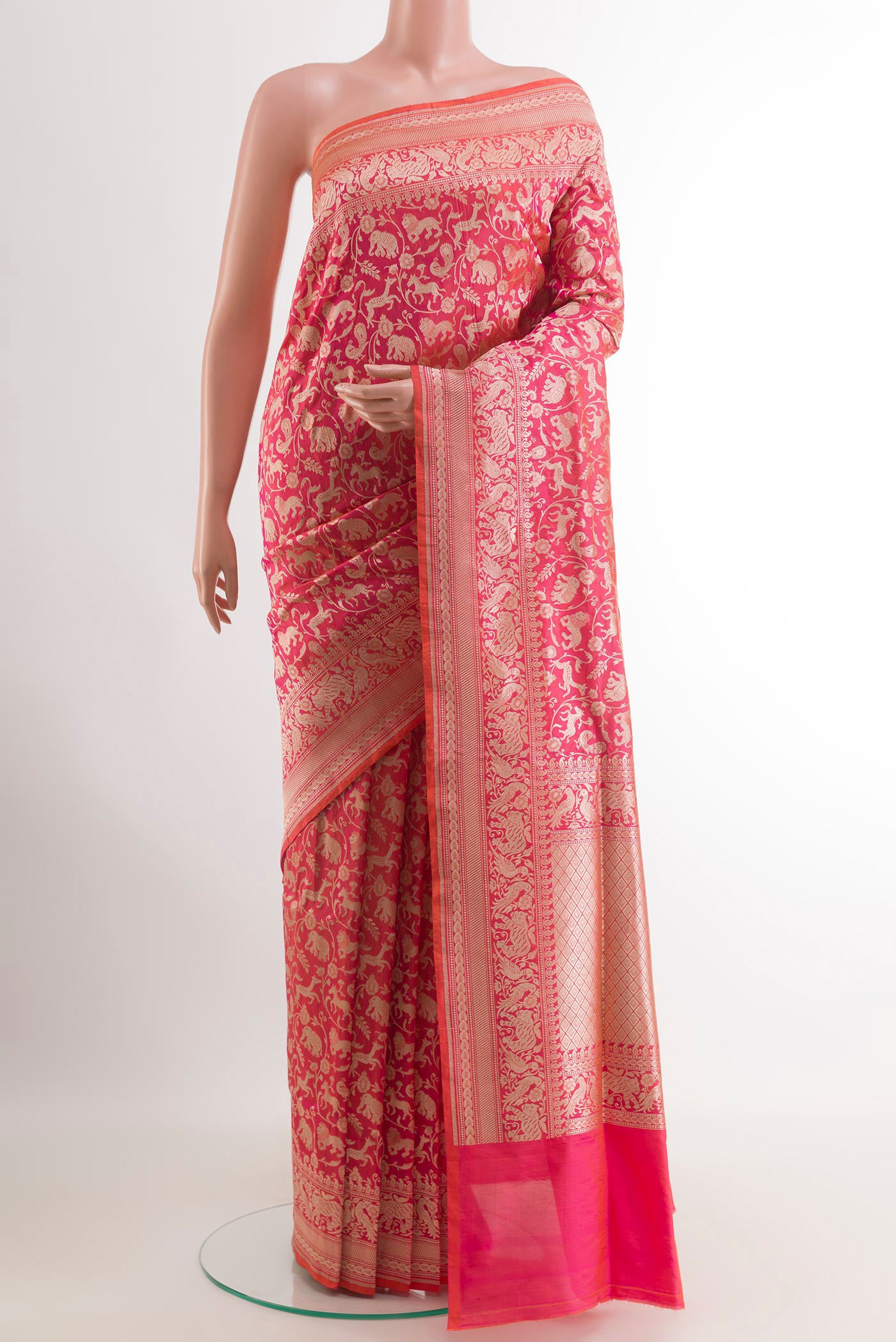 Pink Banarasi Silk Saree with Zari Brocade on the body and Zari Border.  displayed on a mannequin
