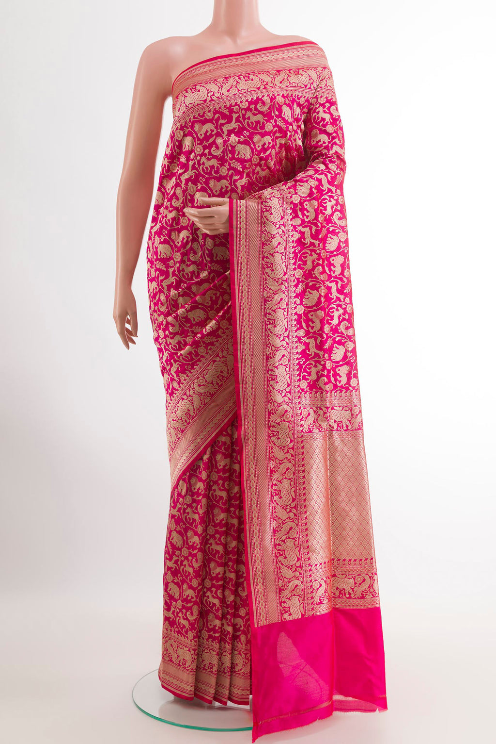Pink Banarasi Silk Saree with Zari Brocade on the body and Zari Border.  displayed on a mannequin